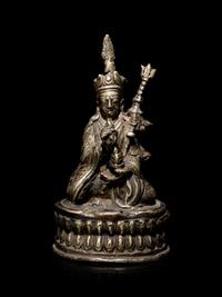 A Sino-Tibetan Silvered Metal Figure of Padmasambhava