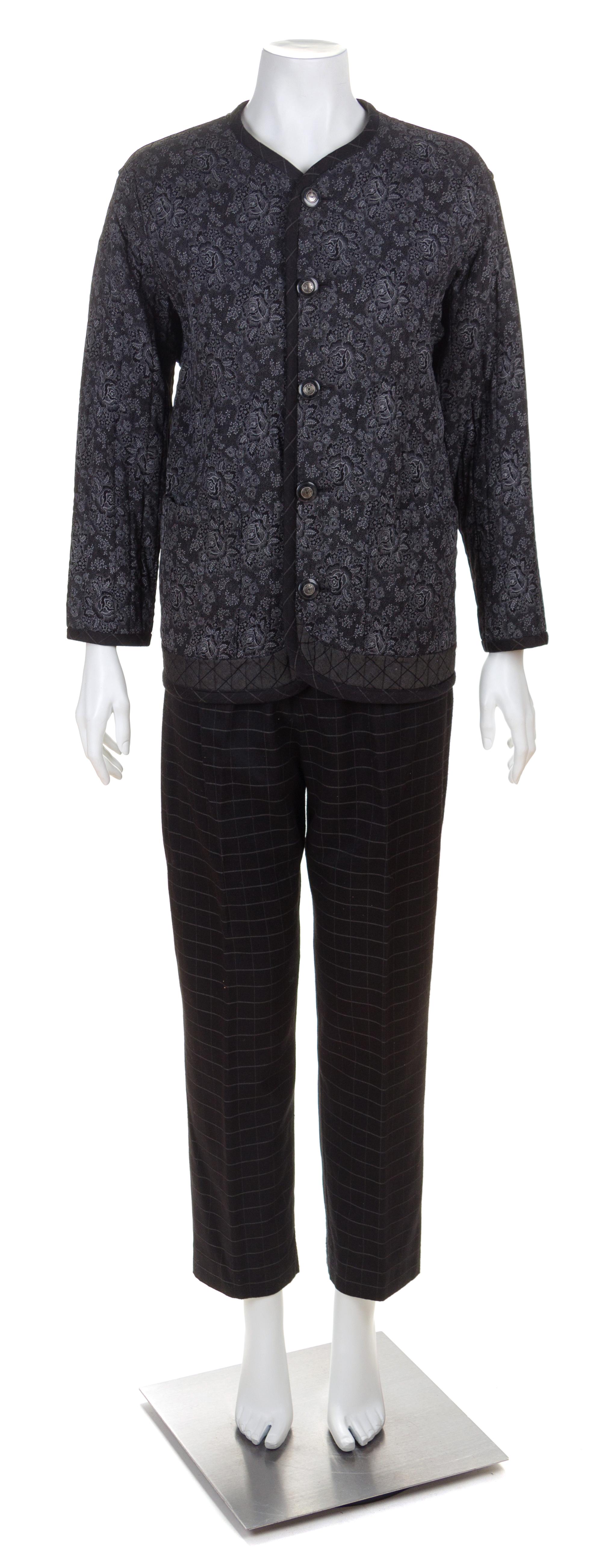 A Koos Black Quilted Reversible Jacket and Pant Suit, Jacket size small.