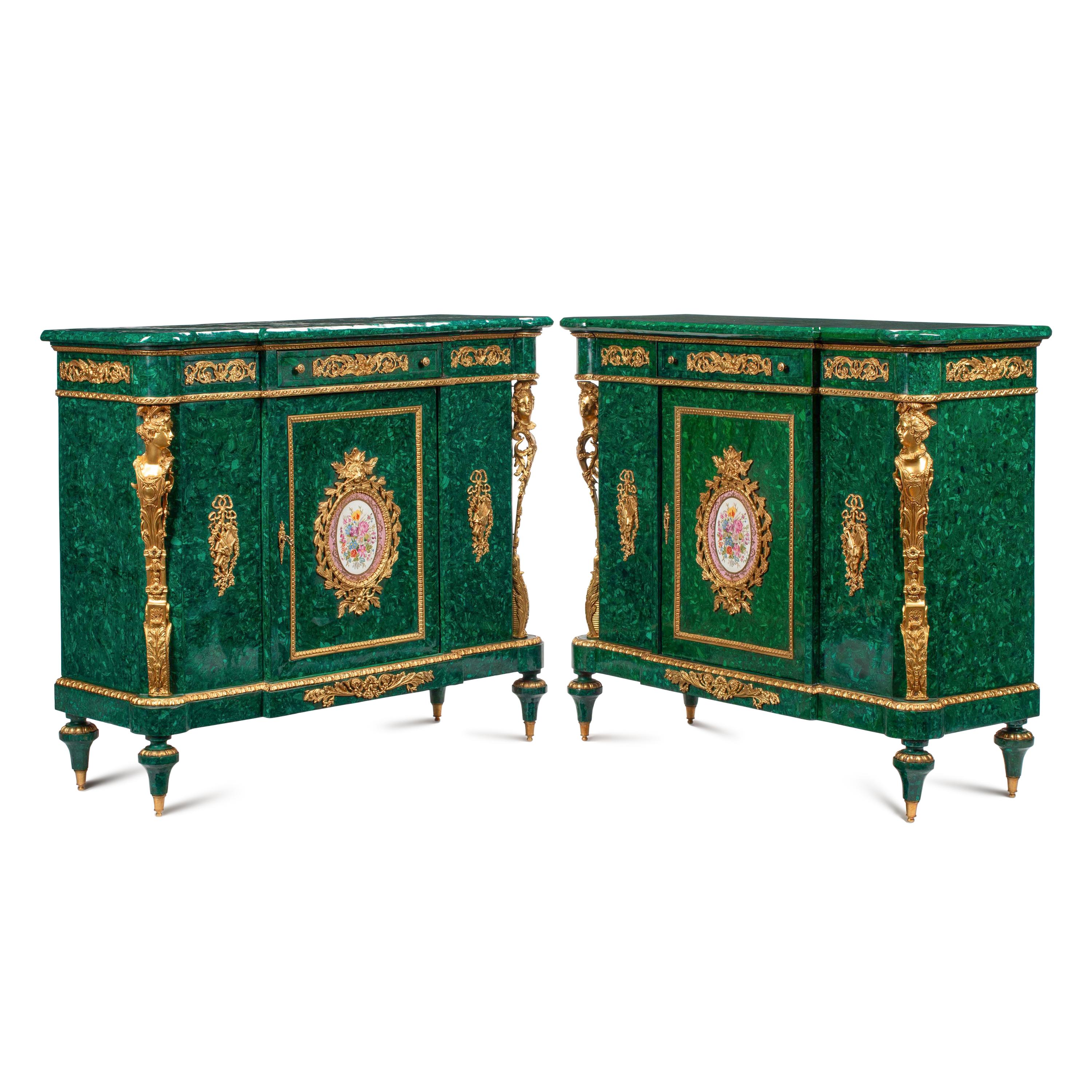 A Pair of Louis XVI Style Gilt Bronze Mounted and Malachite Veneered Cabinets