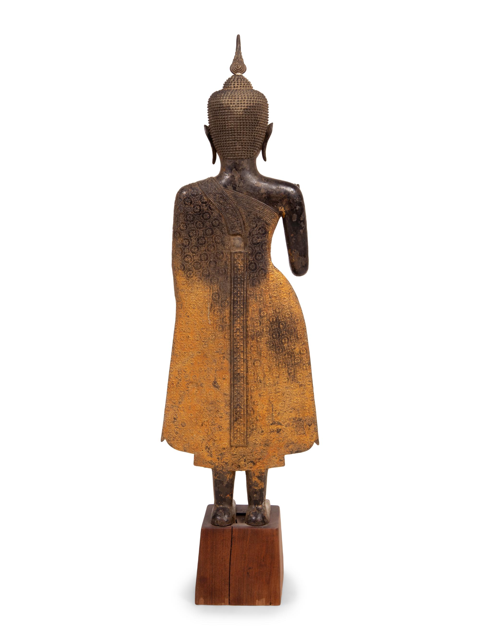 A Large Thai Gilt Decorated Bronze Figure of Standing Buddha