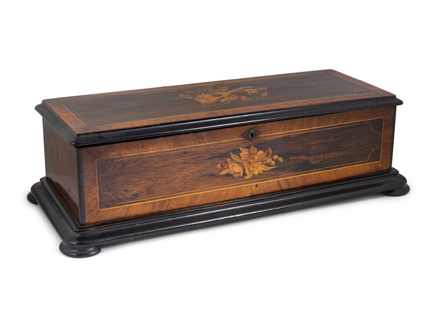 A Swiss Cylinder Music Box in a Rosewood and Marquetry Case