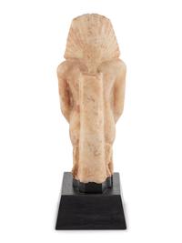 A White Stone Figure of a Kneeling Pharaoh