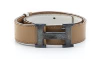 An Hermes Tan and Ivory Reversible Leather Constance Belt,