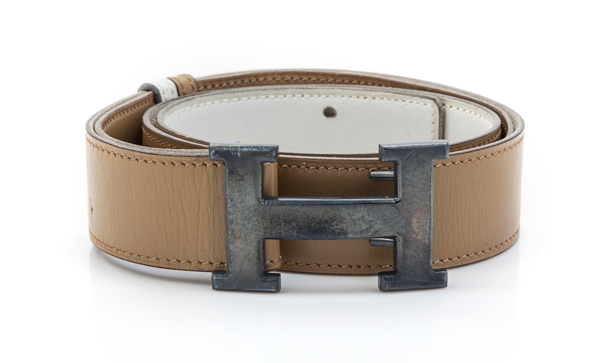An Hermes Tan and Ivory Reversible Leather Constance Belt,