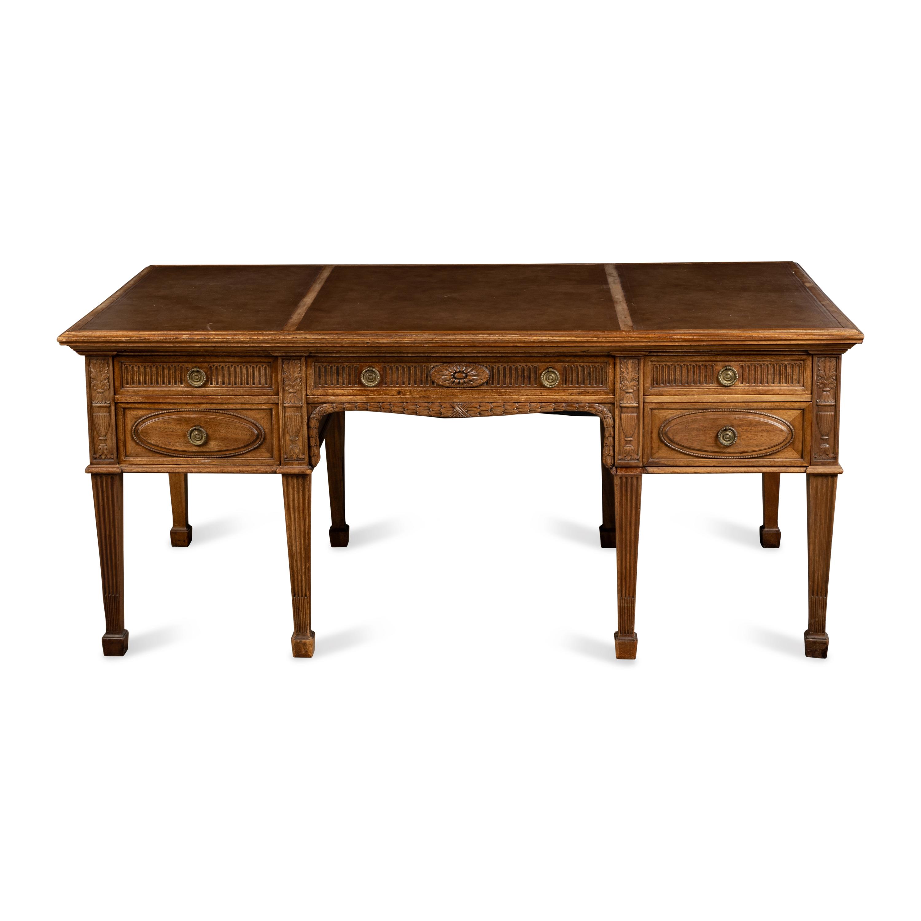 A George III Style Carved Mahogany Partner's Desk