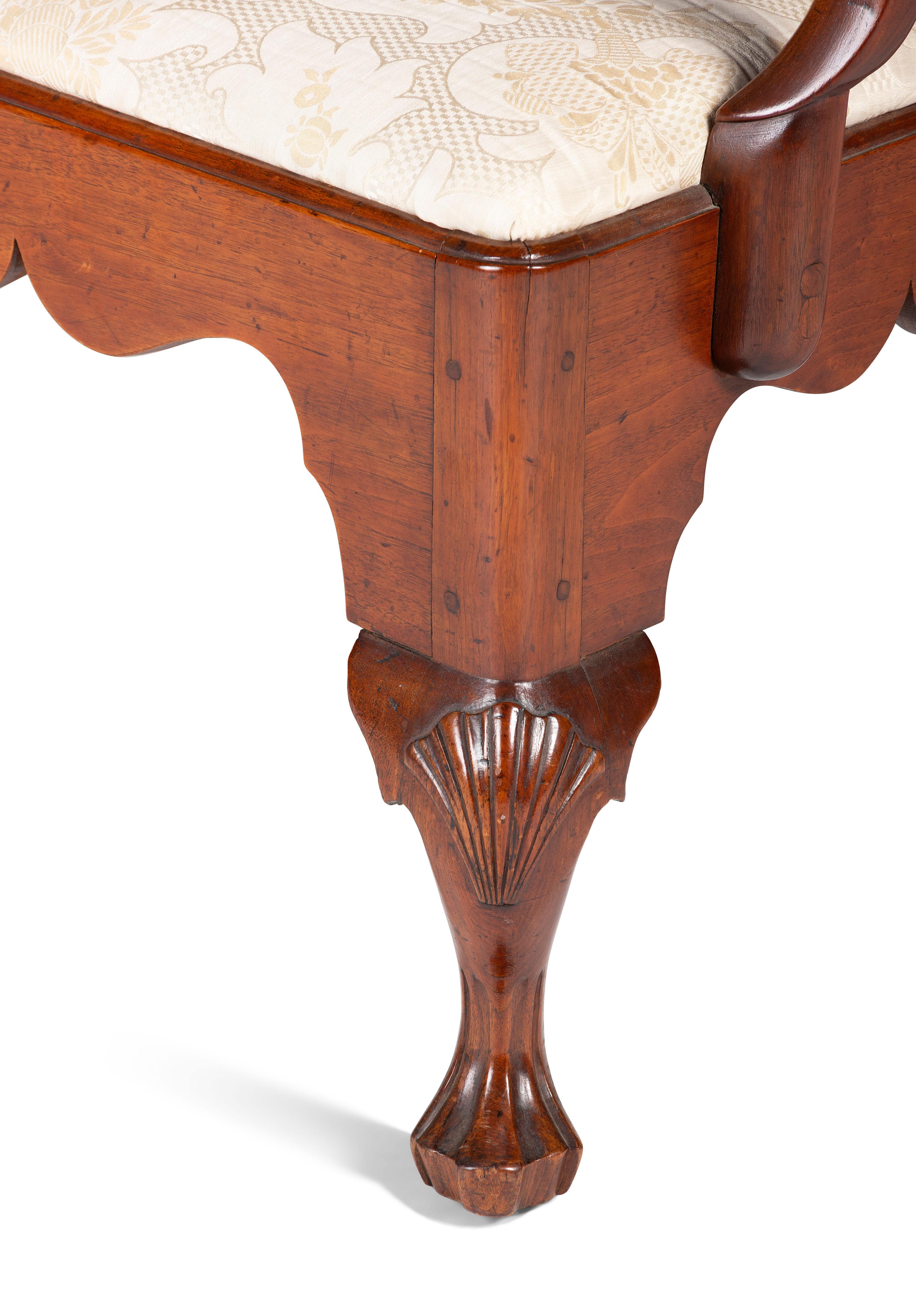 A Queen Anne Carved Walnut Armchair