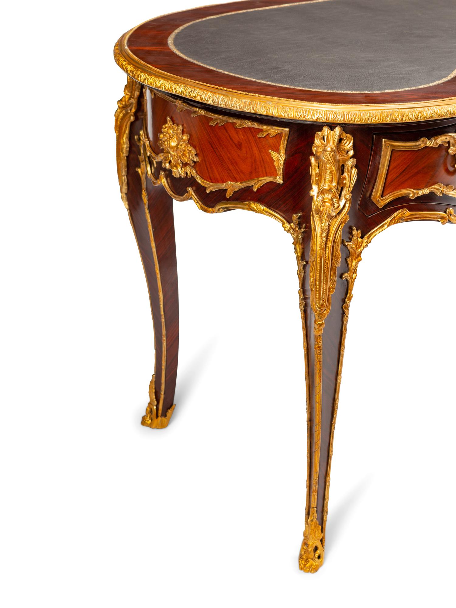 A Louis XV Style Gilt Bronze Mounted Reniform Bureau Plat