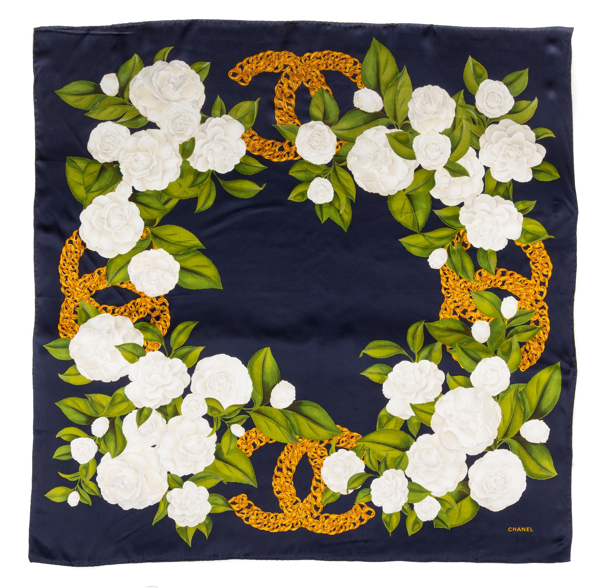 A Chanel Navy Silk Camelia Scarf, 38" x 38".