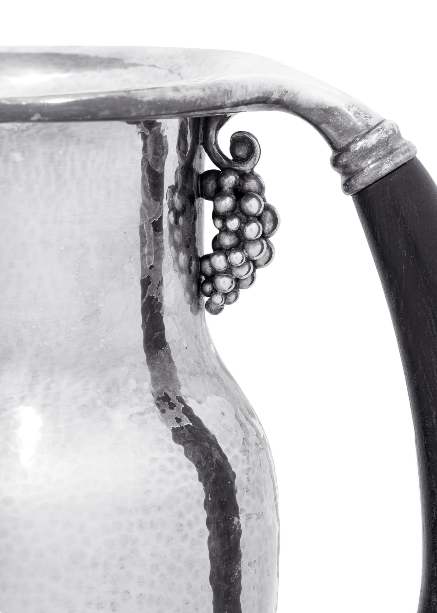A Georg Jensen Silver Grape Pattern Pitcher