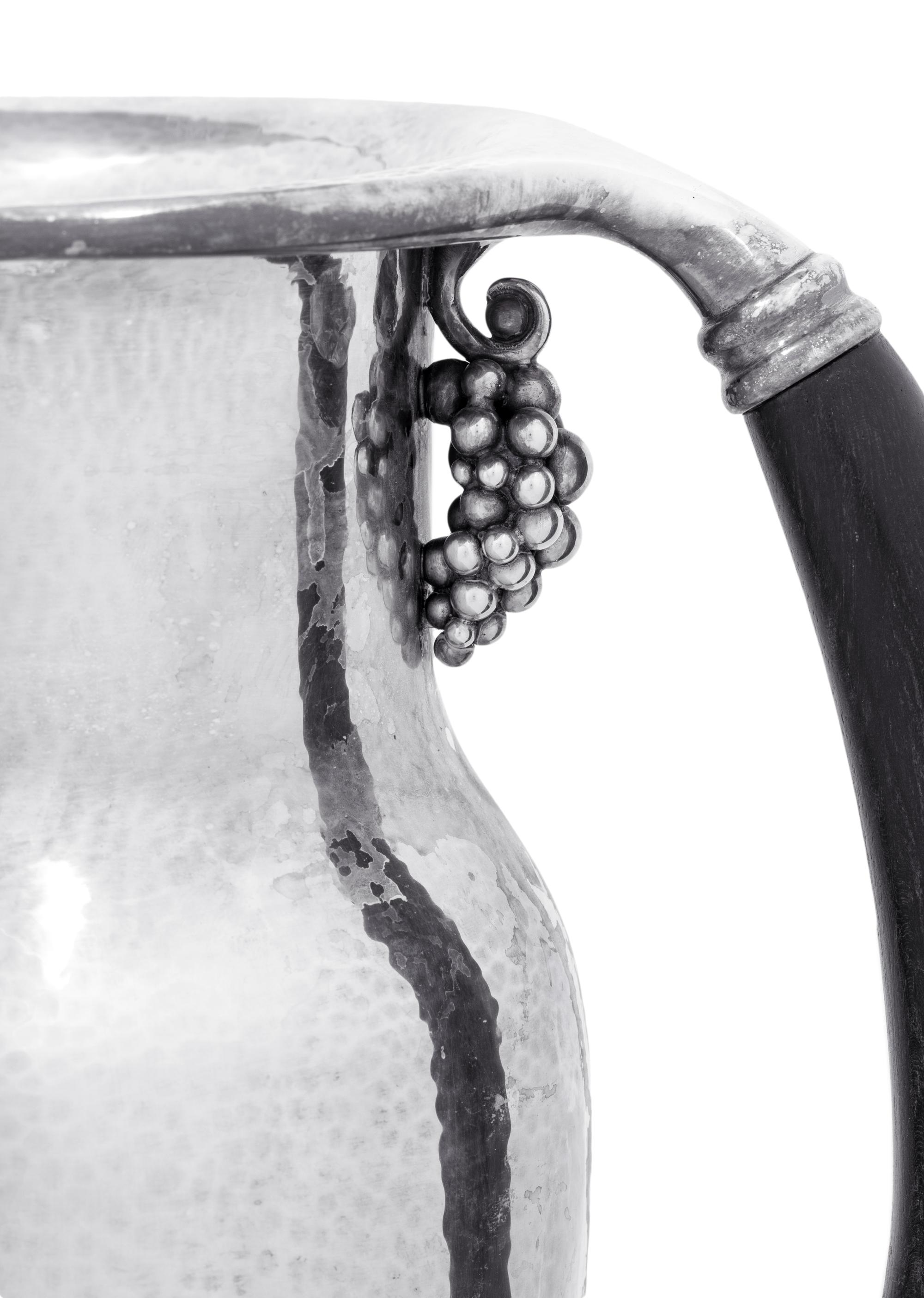 A Georg Jensen Silver Grape Pattern Pitcher