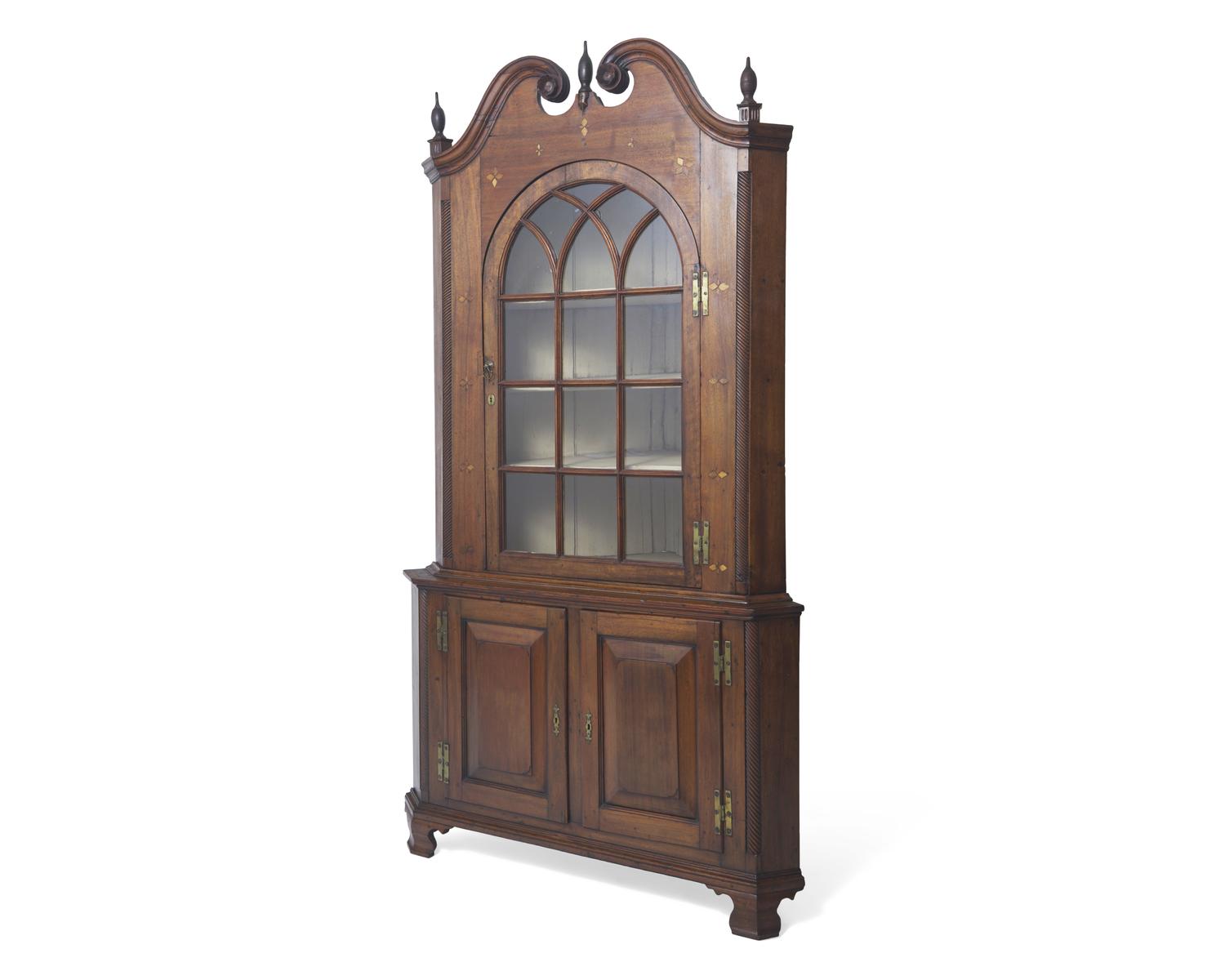 A Chippendale Inlaid Walnut Corner Cupboard, Pennsylvania, Late 18th Century