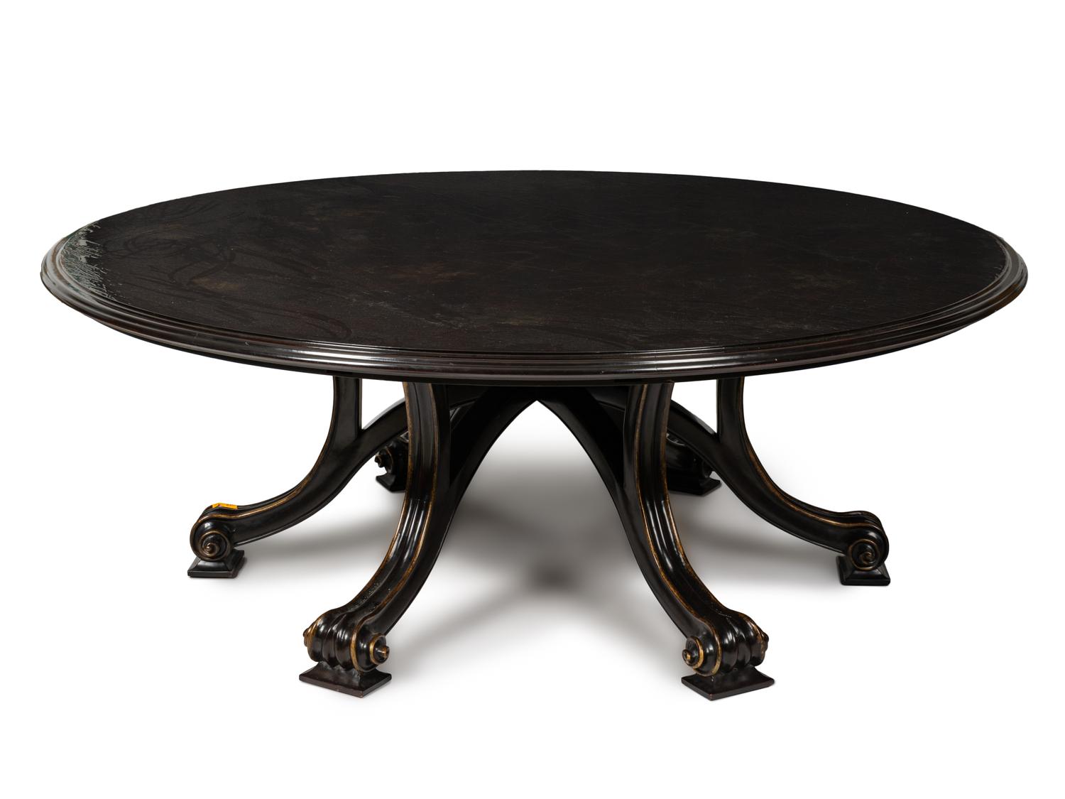 A Therien Studios Ebonized Walnut Volute Circular Extension Dining Table