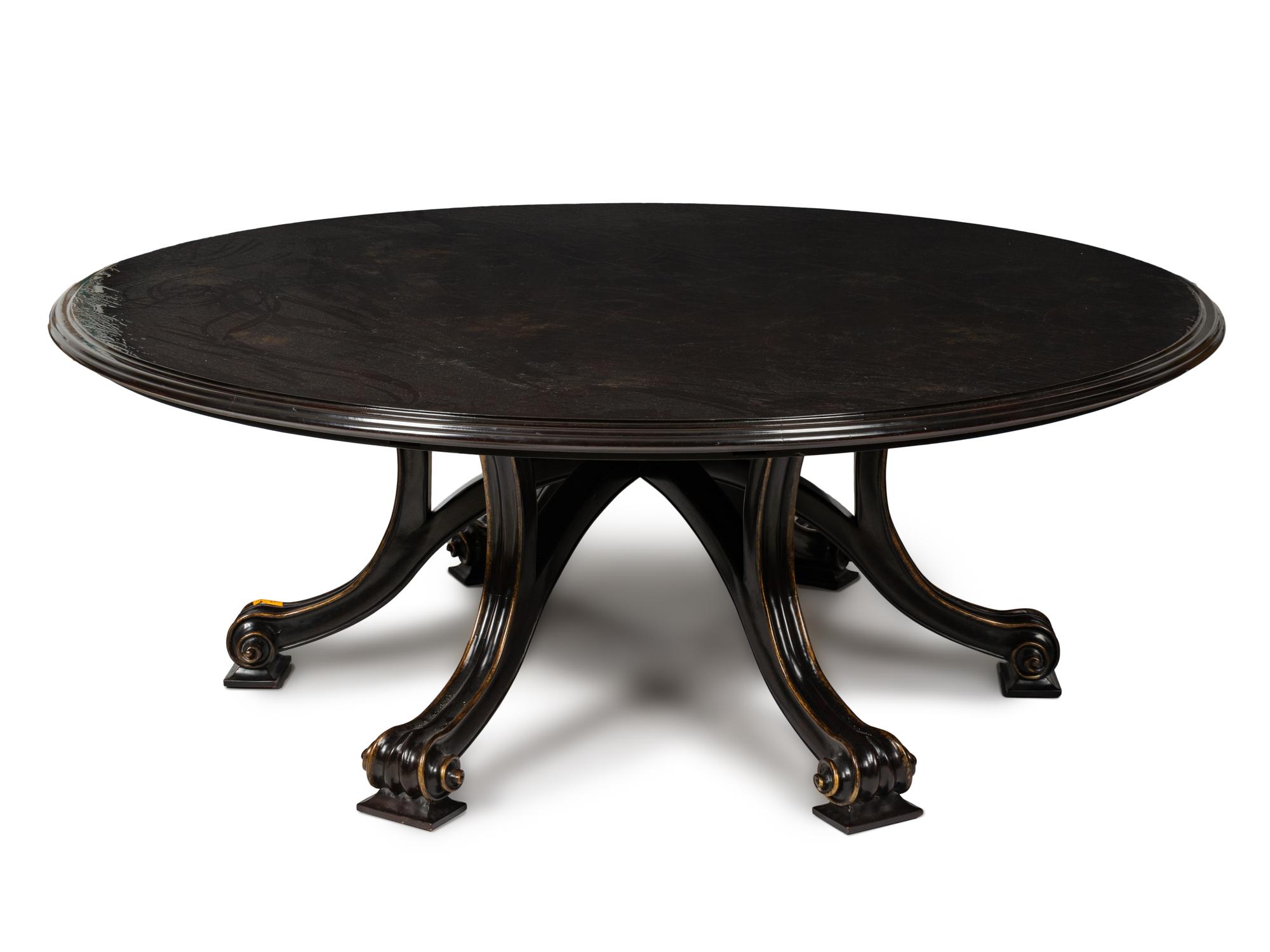 A Therien Studios Ebonized Walnut Volute Circular Extension Dining Table