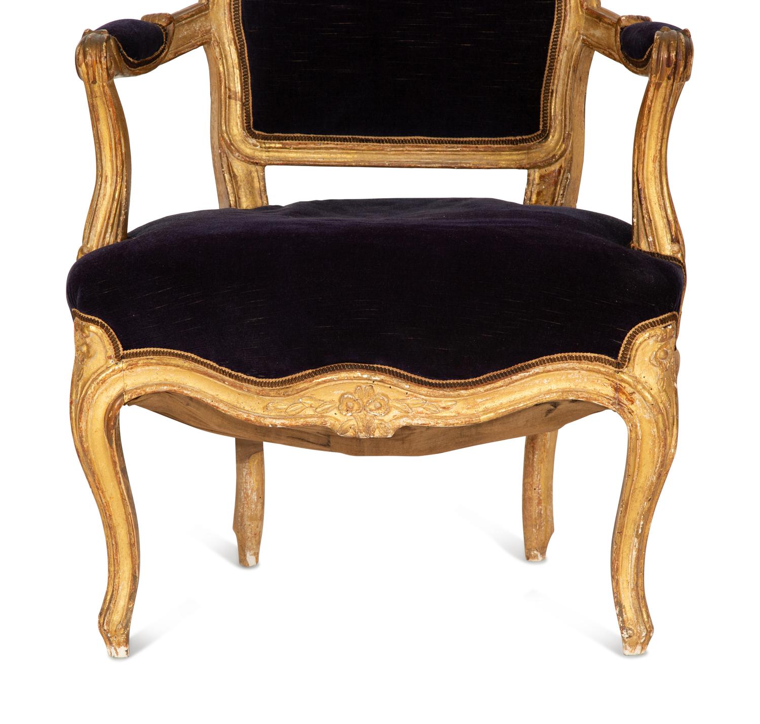 A Pair of Louis XV Giltwood Fauteuils