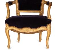 A Pair of Louis XV Giltwood Fauteuils