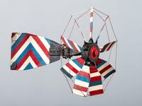 A Patriotic Red, White and Blue Painted Sheet Metal Whirligig