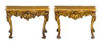 A Pair of Rococo Style Giltwood Console Tables Height 37 x width 58 x depth 26 inches. — 18TH CENTURY