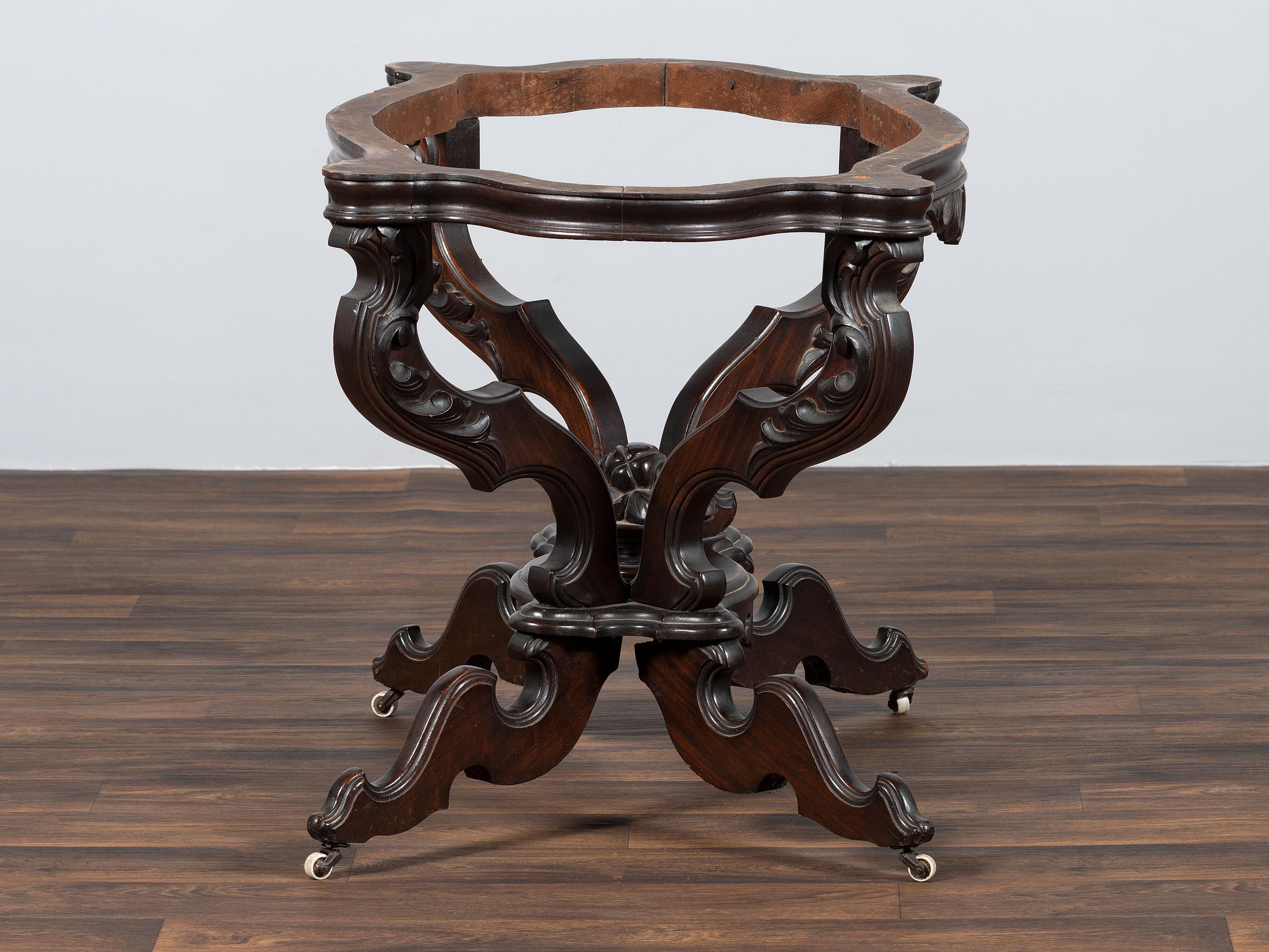 A Renaissance Revival Carved Walnut Marble Top Center Table