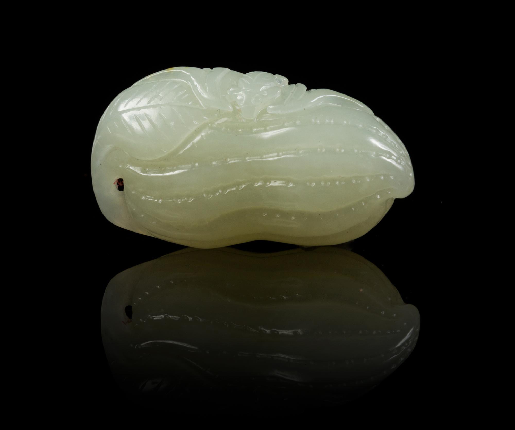 A Celadon Jade Toggle Length 1 3/4 inches.