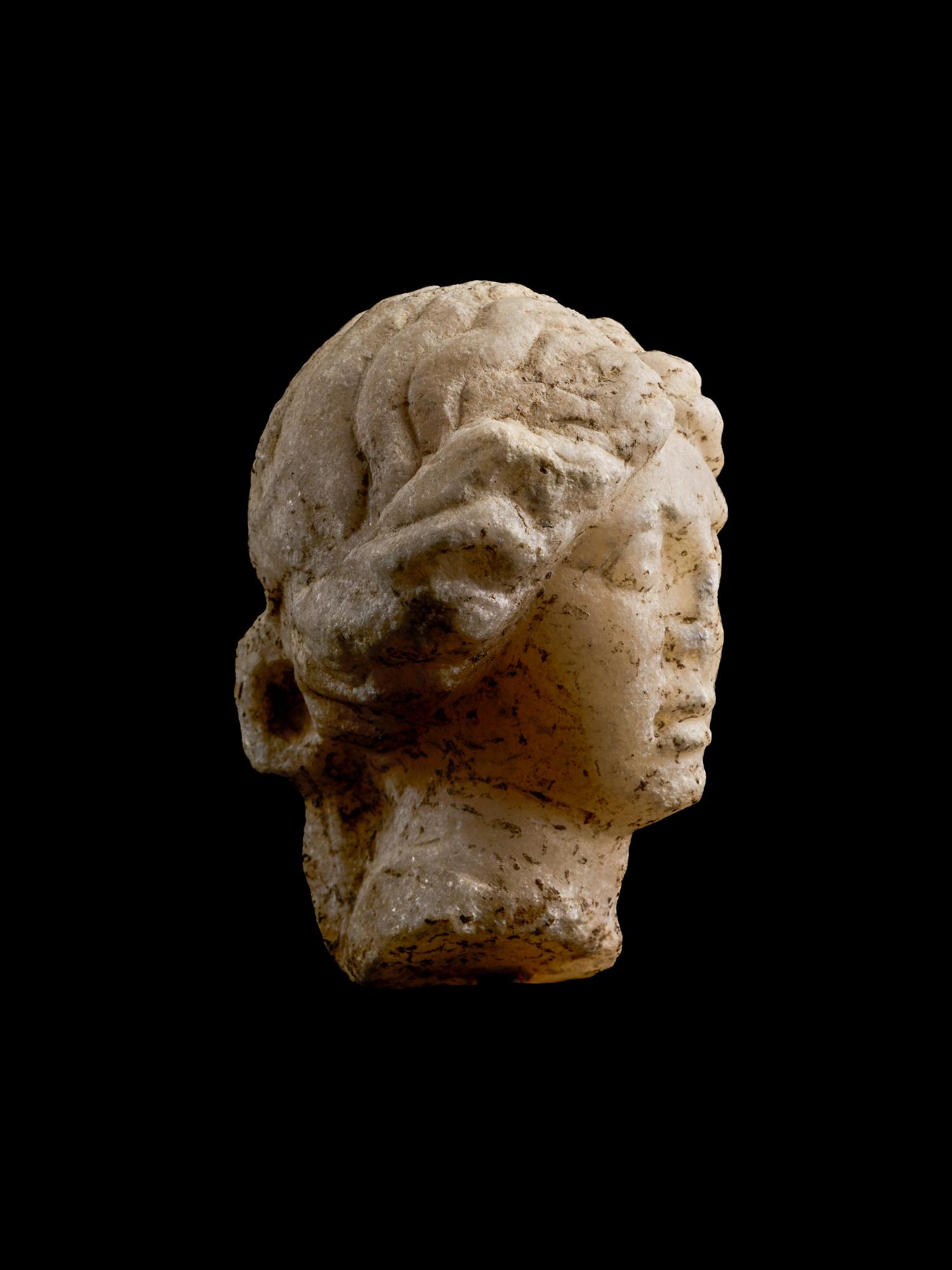 A Roman Marble Head of a Woman