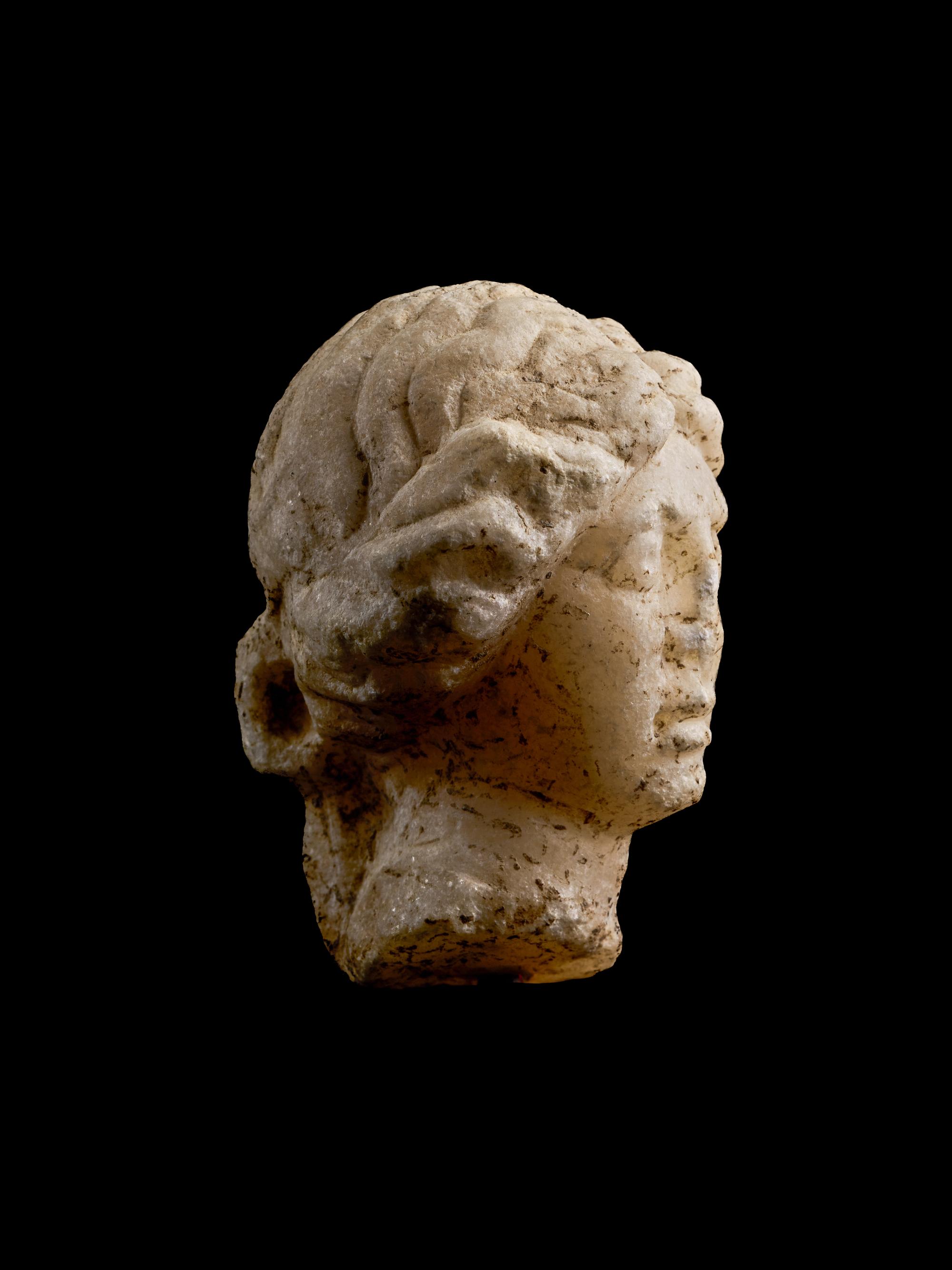 A Roman Marble Head of a Woman