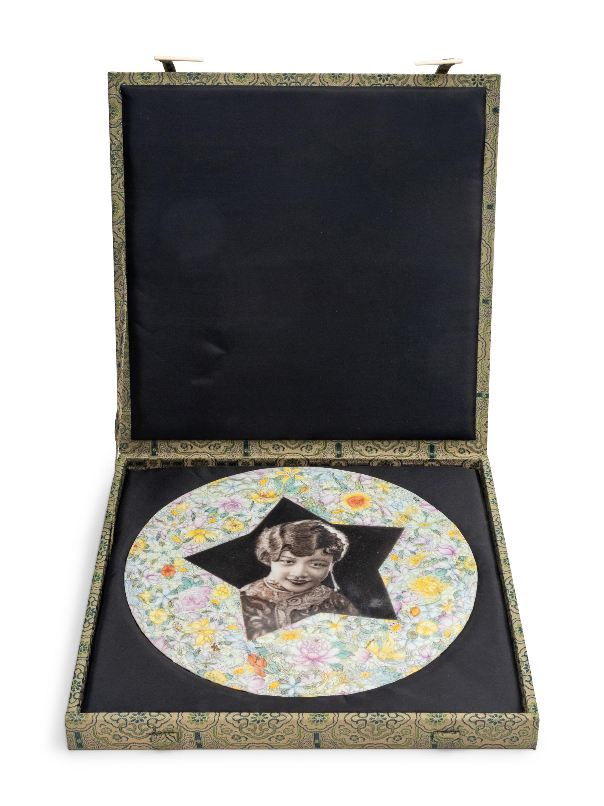 A Rare Chinese Black Enameled and Famille Rose Porcelain Circular 'Portrait' Plaque