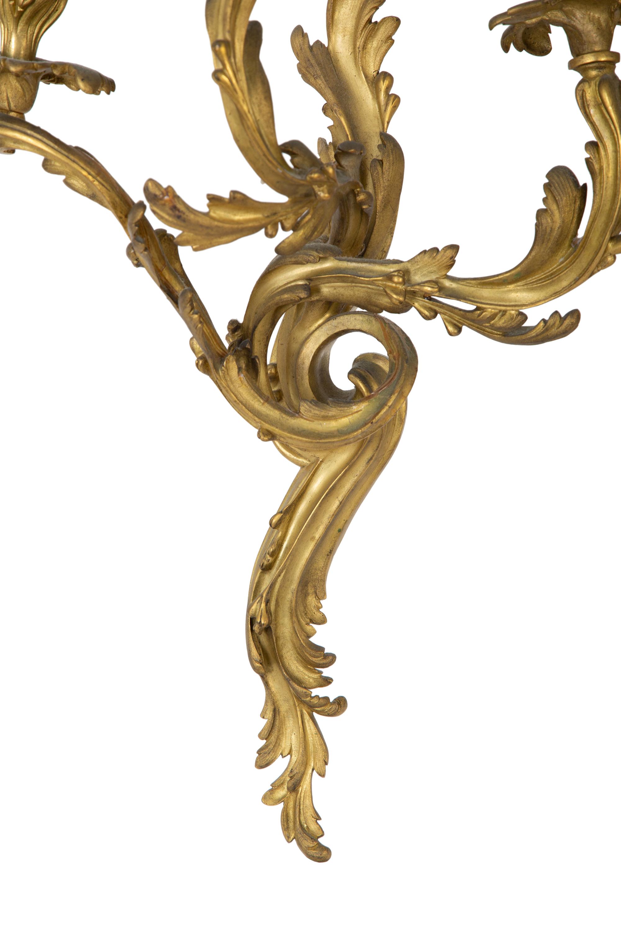 A Pair of Rococo Style Gilt Bronze and Crystal Three-Light Wall Sconces — LATE 19TH CENTURY