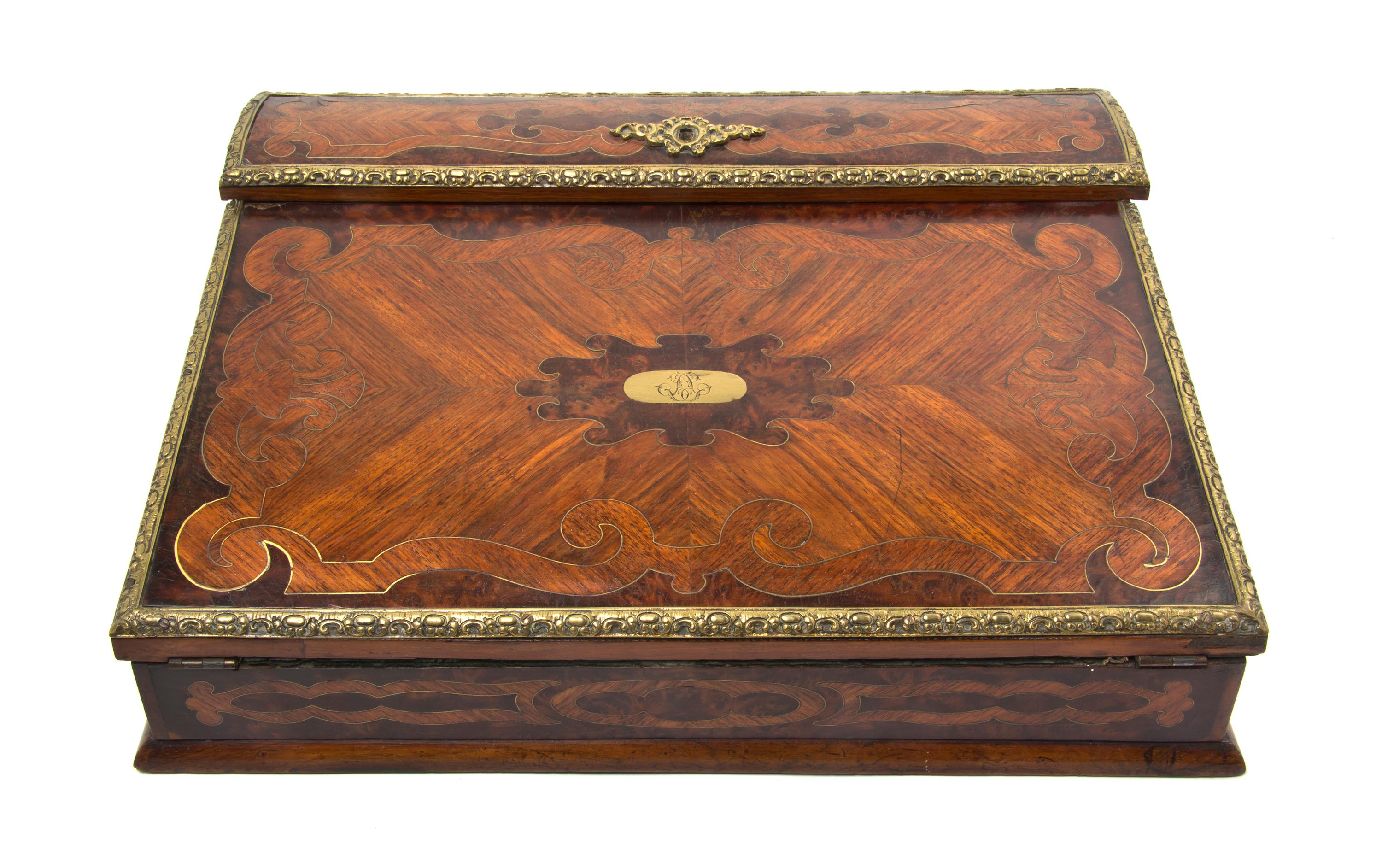 A Continental Marquetry and Gilt Metal Mounted Lap Desk, Width 14 1/4 inches.