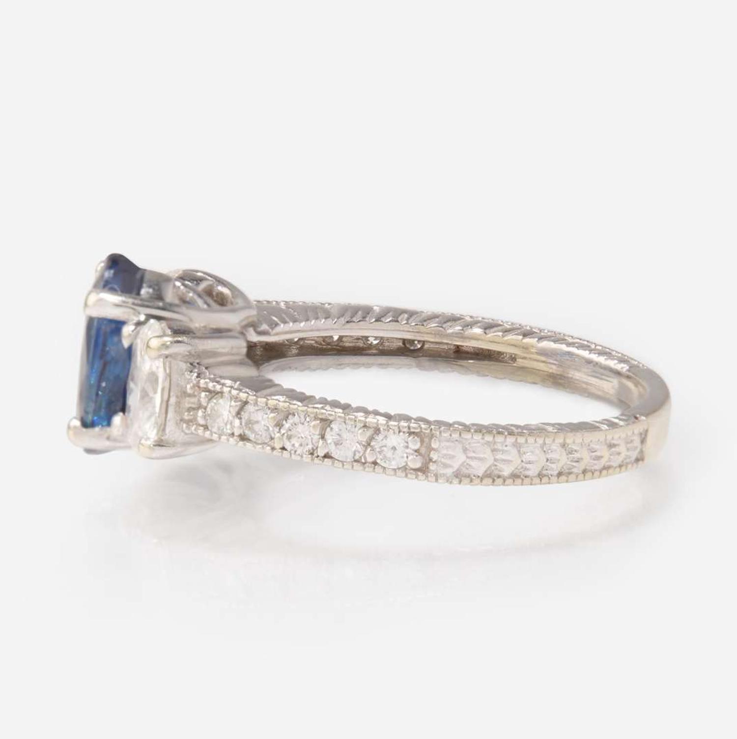 A Sapphire and Diamond White Gold Ring