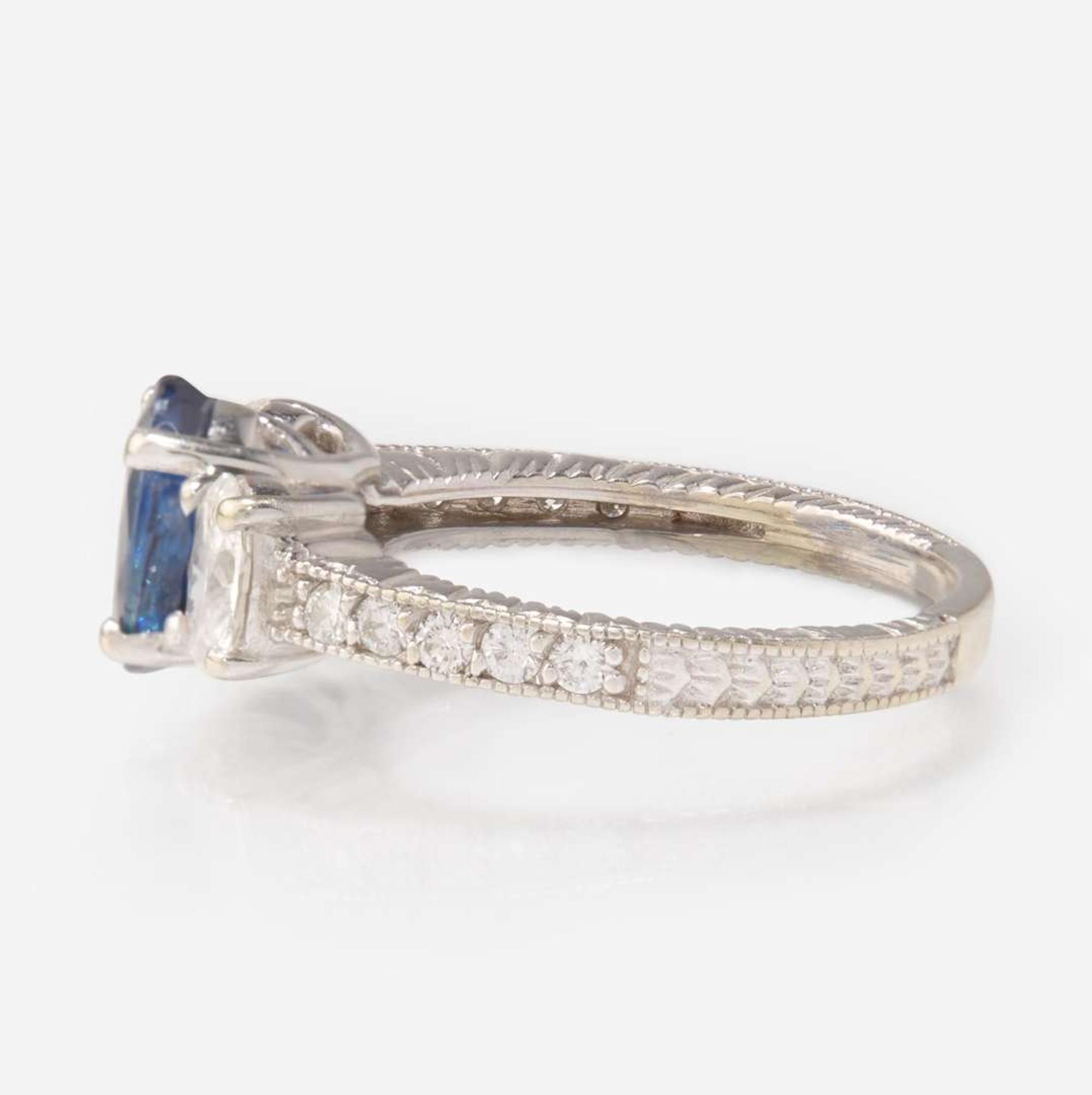 A Sapphire and Diamond White Gold Ring