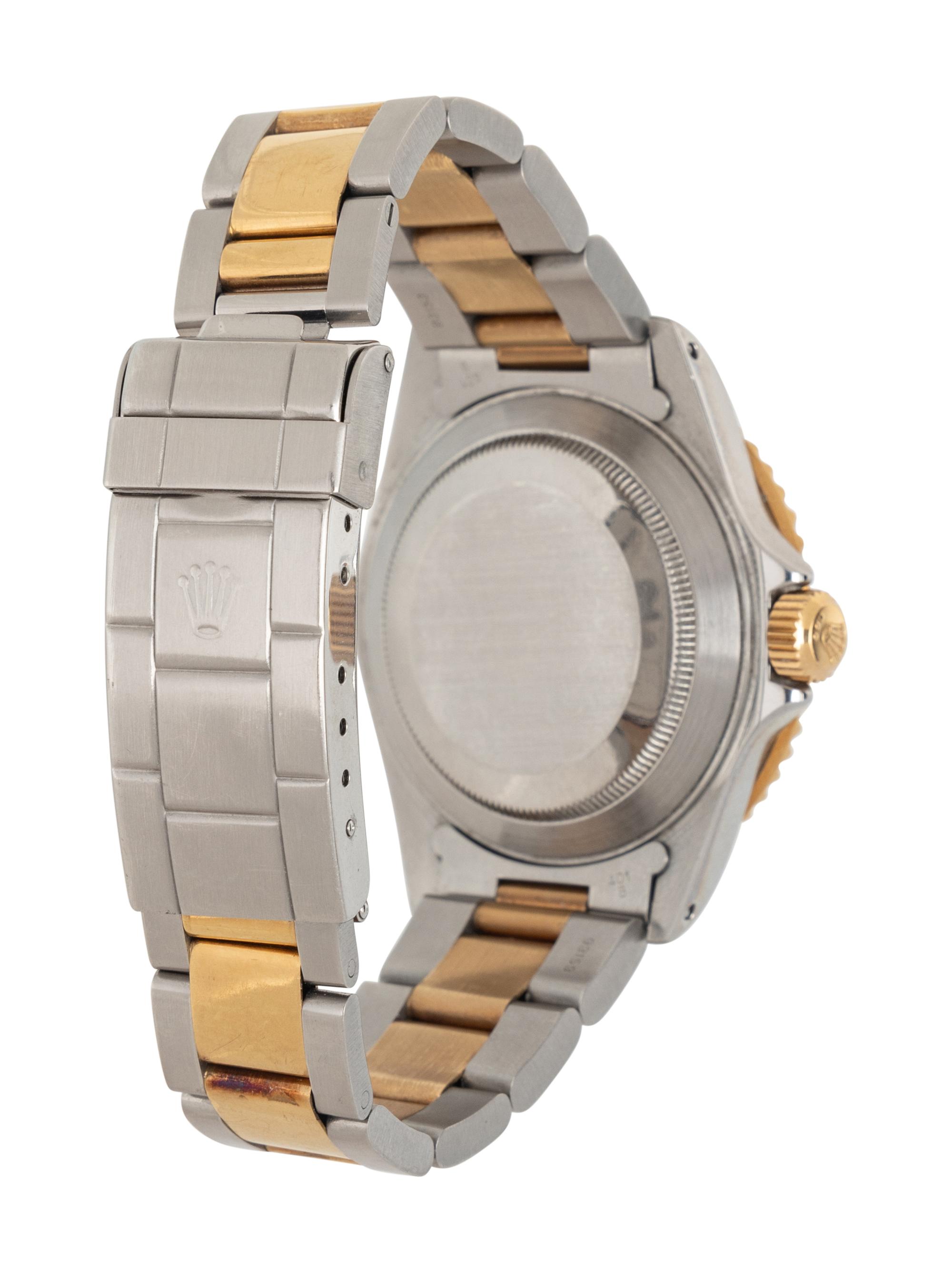 ROLEX, REF. 16613 STAINLESS STEEL AND 18K YELLOW GOLD 'SUBMARINER' WATCH