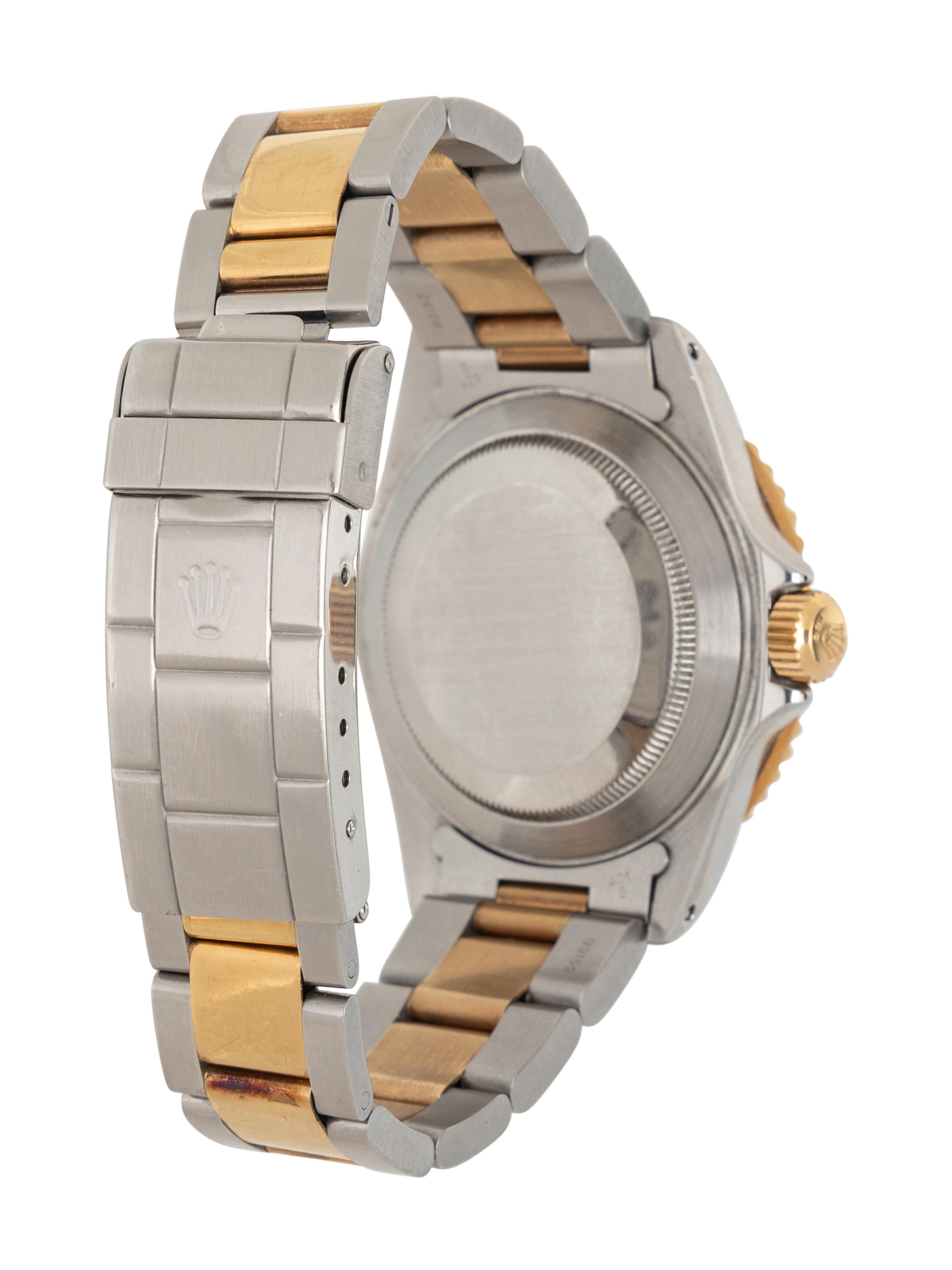 ROLEX, REF. 16613 STAINLESS STEEL AND 18K YELLOW GOLD 'SUBMARINER' WATCH