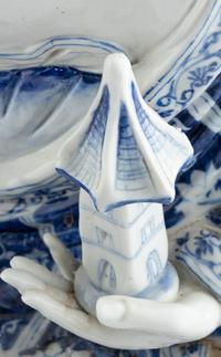 Two Blue and White Glazed Seated Figures