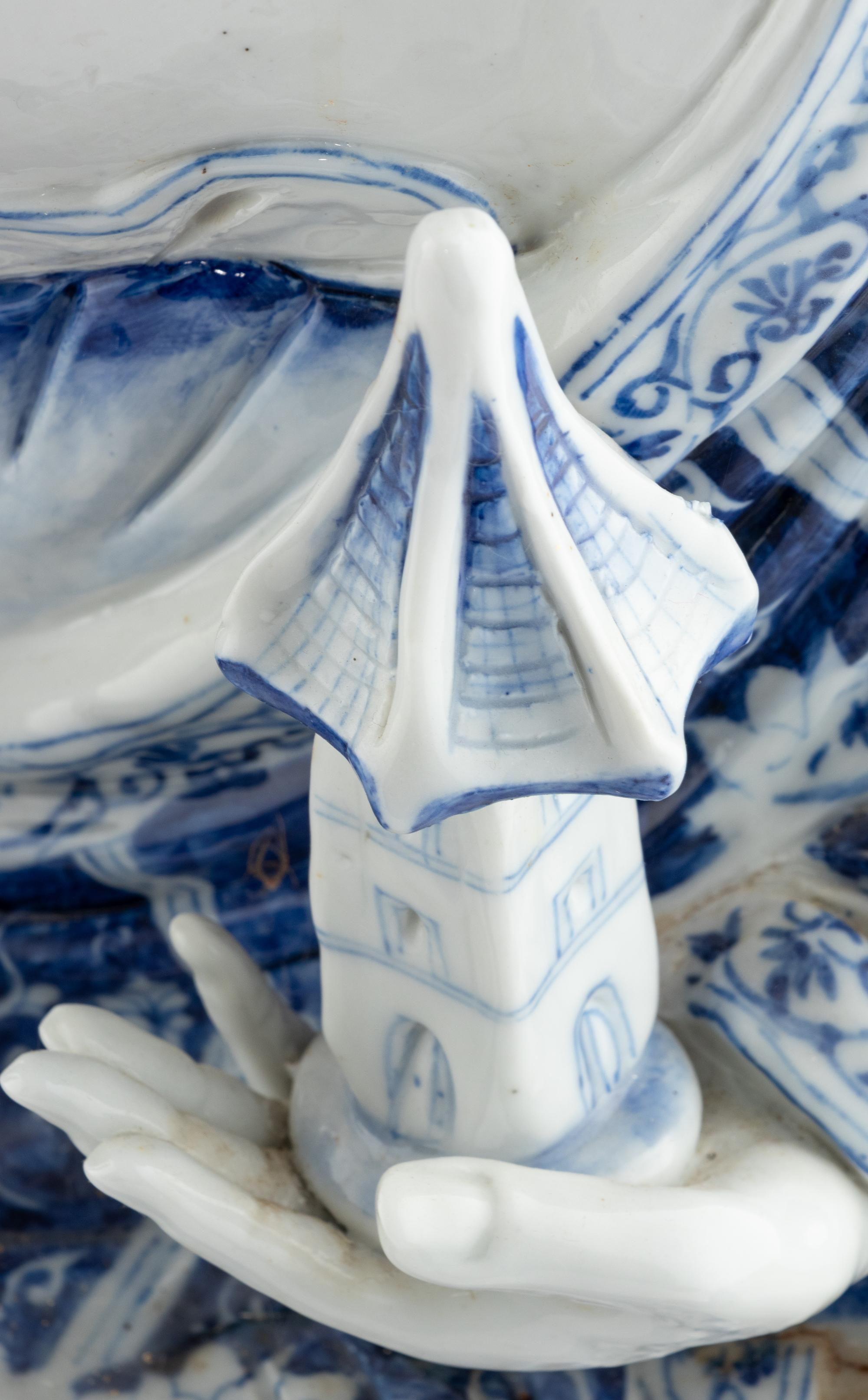Two Blue and White Glazed Seated Figures