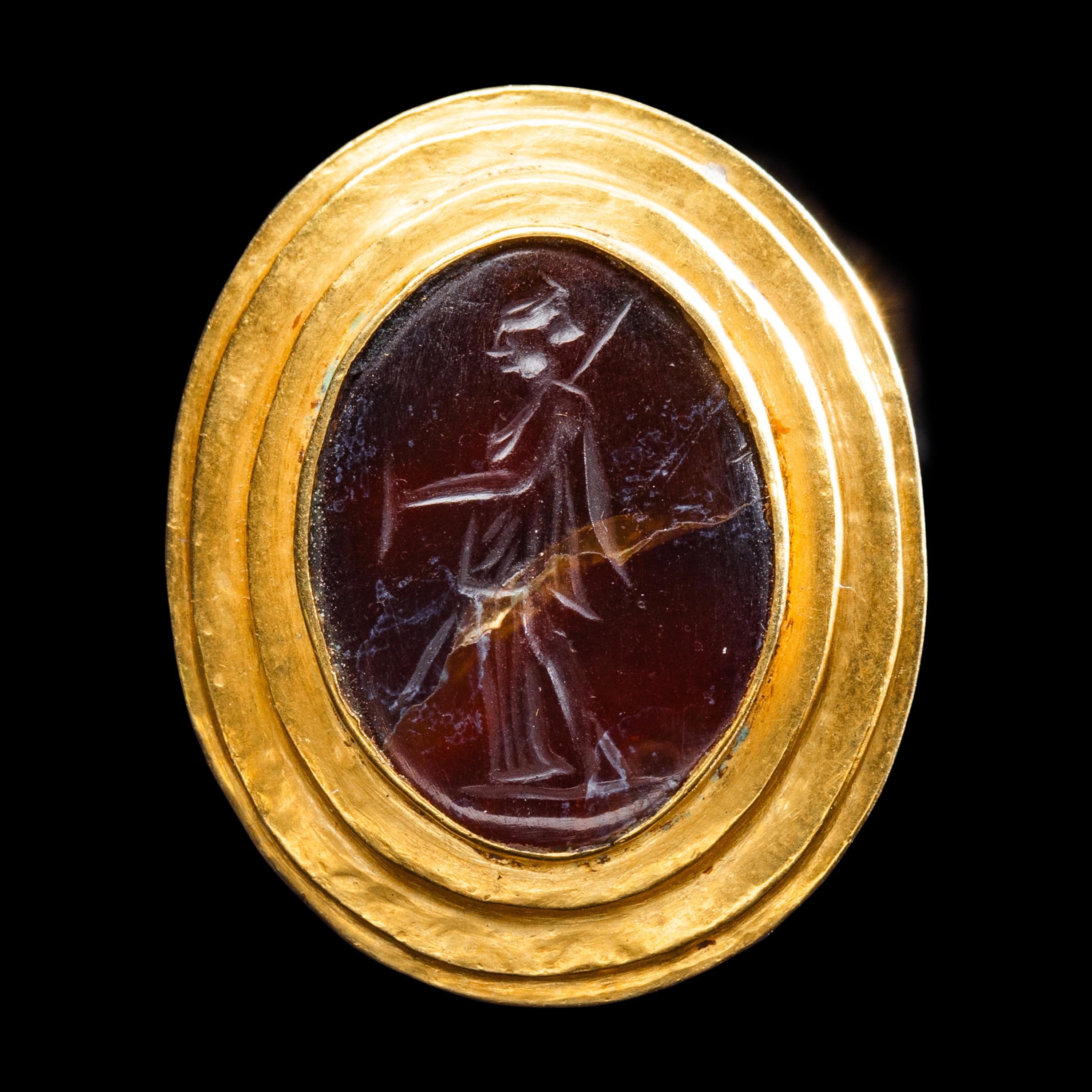 A Greek Gold and Carnelian Finger Ring with the Goddess Artemis