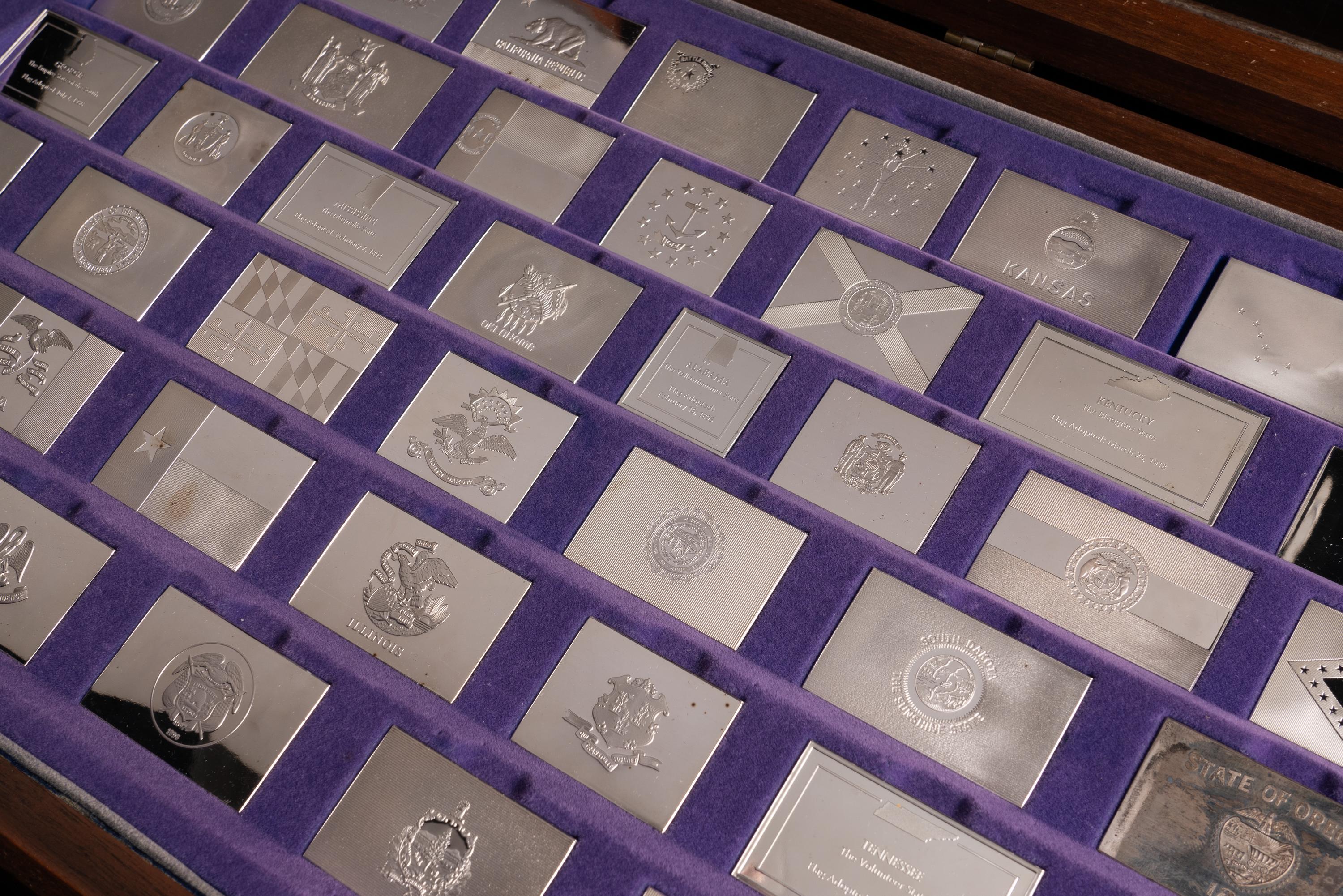 [PRIVATE ISSUE] A Franklin Mint Sterling Silver 50-State Flag Medallion Set