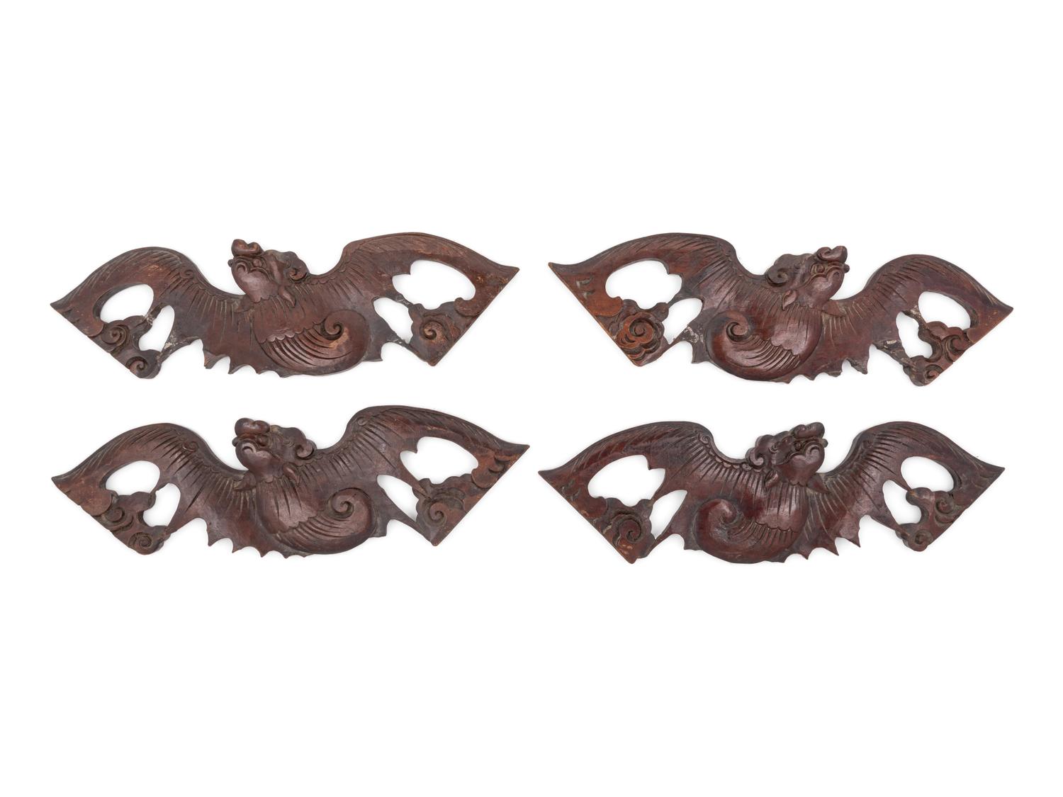 A Set of Four Chinese Hardwood Bat-Form Panels