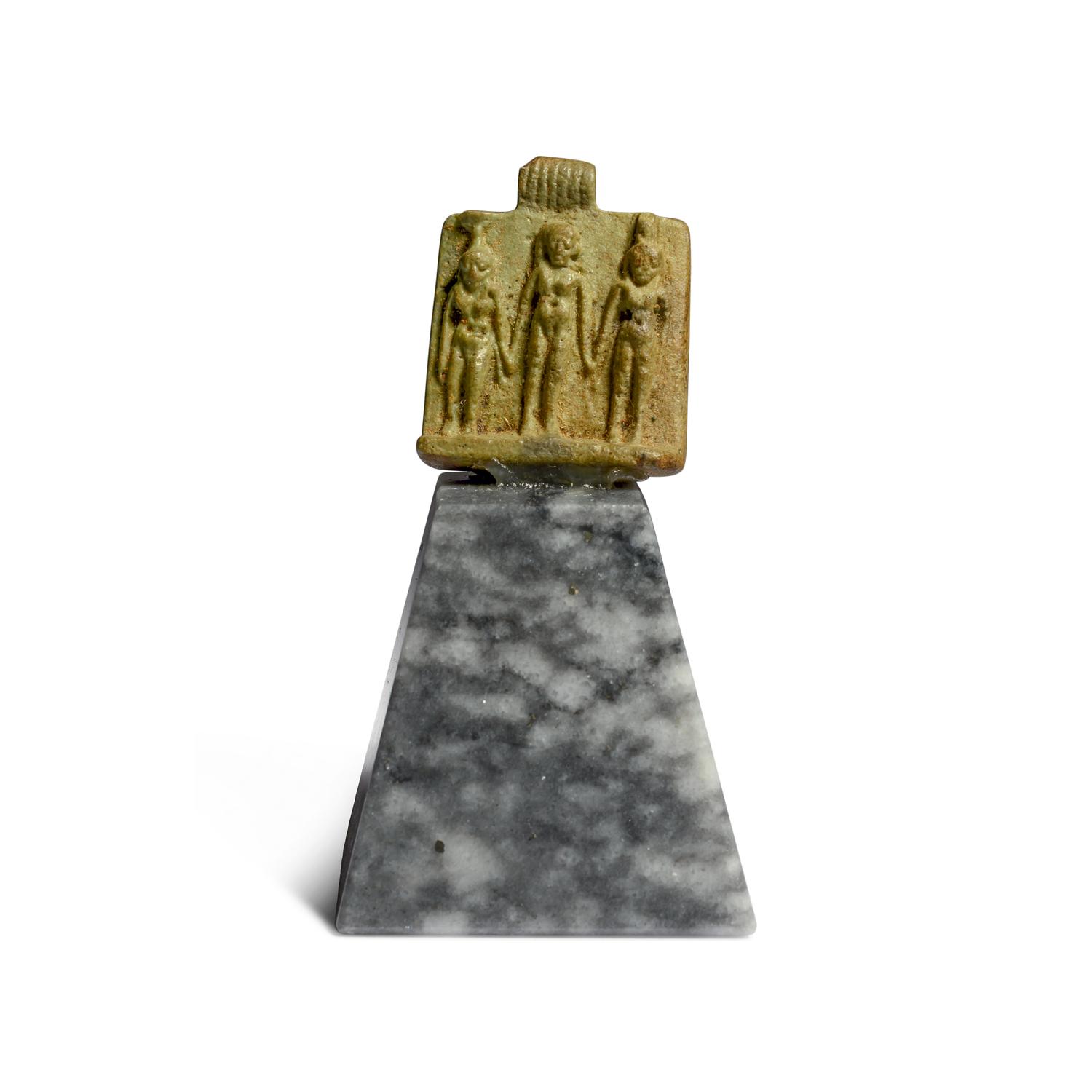 An Egyptian Faience Triad Amulet