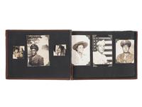 [WORLD WAR II]. A collection of over 100 snapshots of African American soldiers, sweethearts, and family. Ca 1940s-1950s.