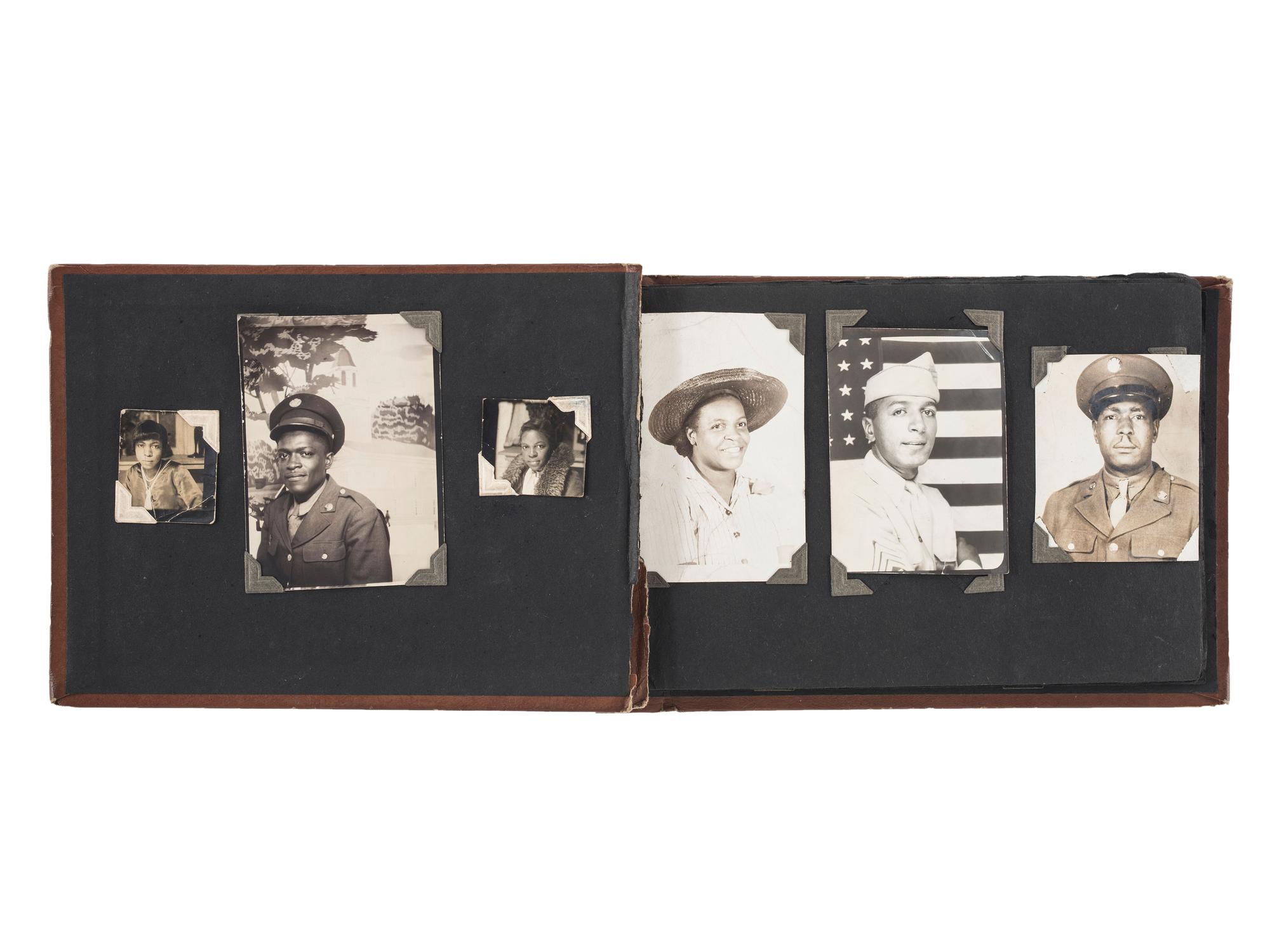 [WORLD WAR II]. A collection of over 100 snapshots of African American soldiers, sweethearts, and family. Ca 1940s-1950s.