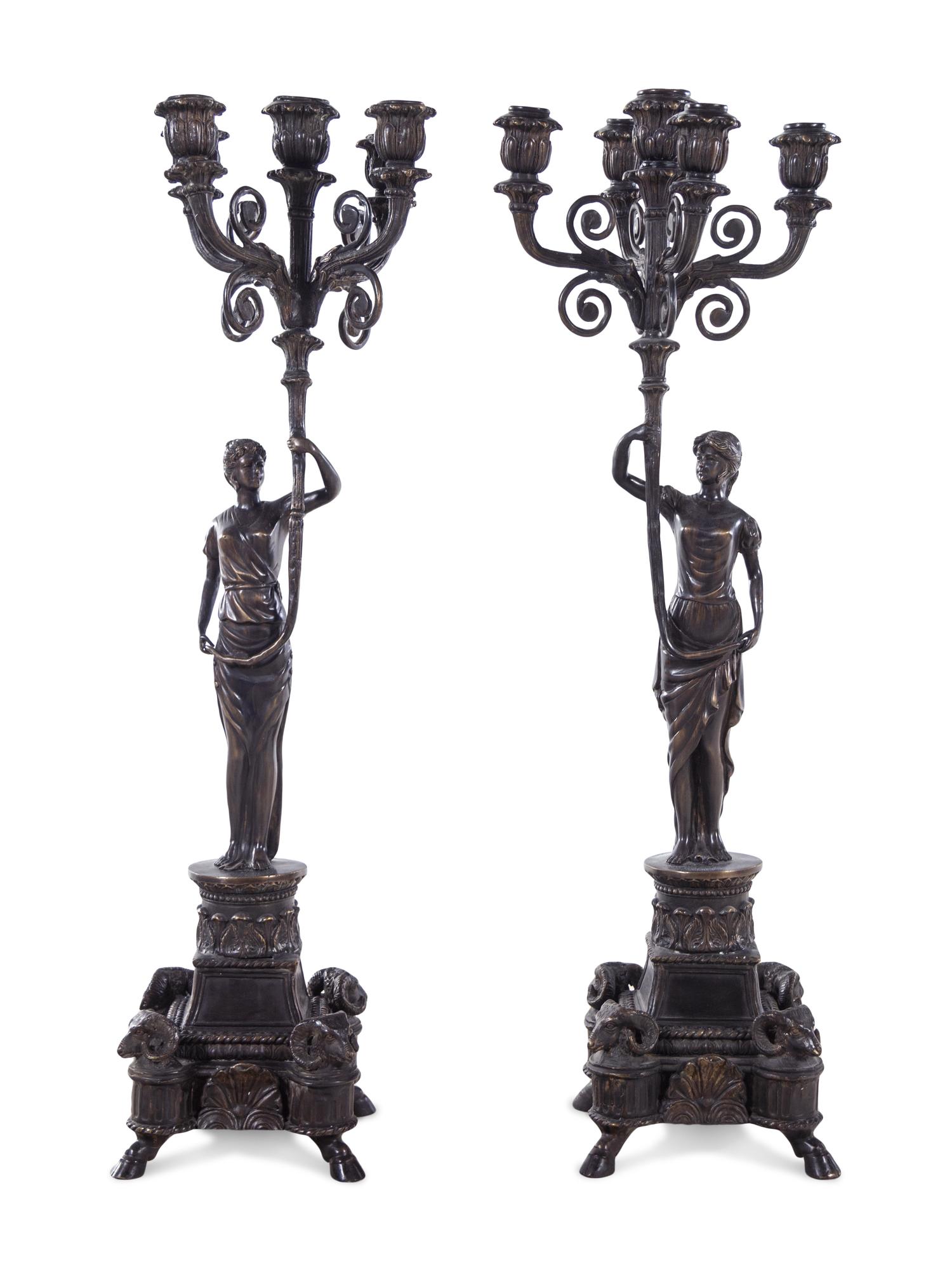 A Pair of Empire Style Silvered Metal Figural Five-Light Candelabra