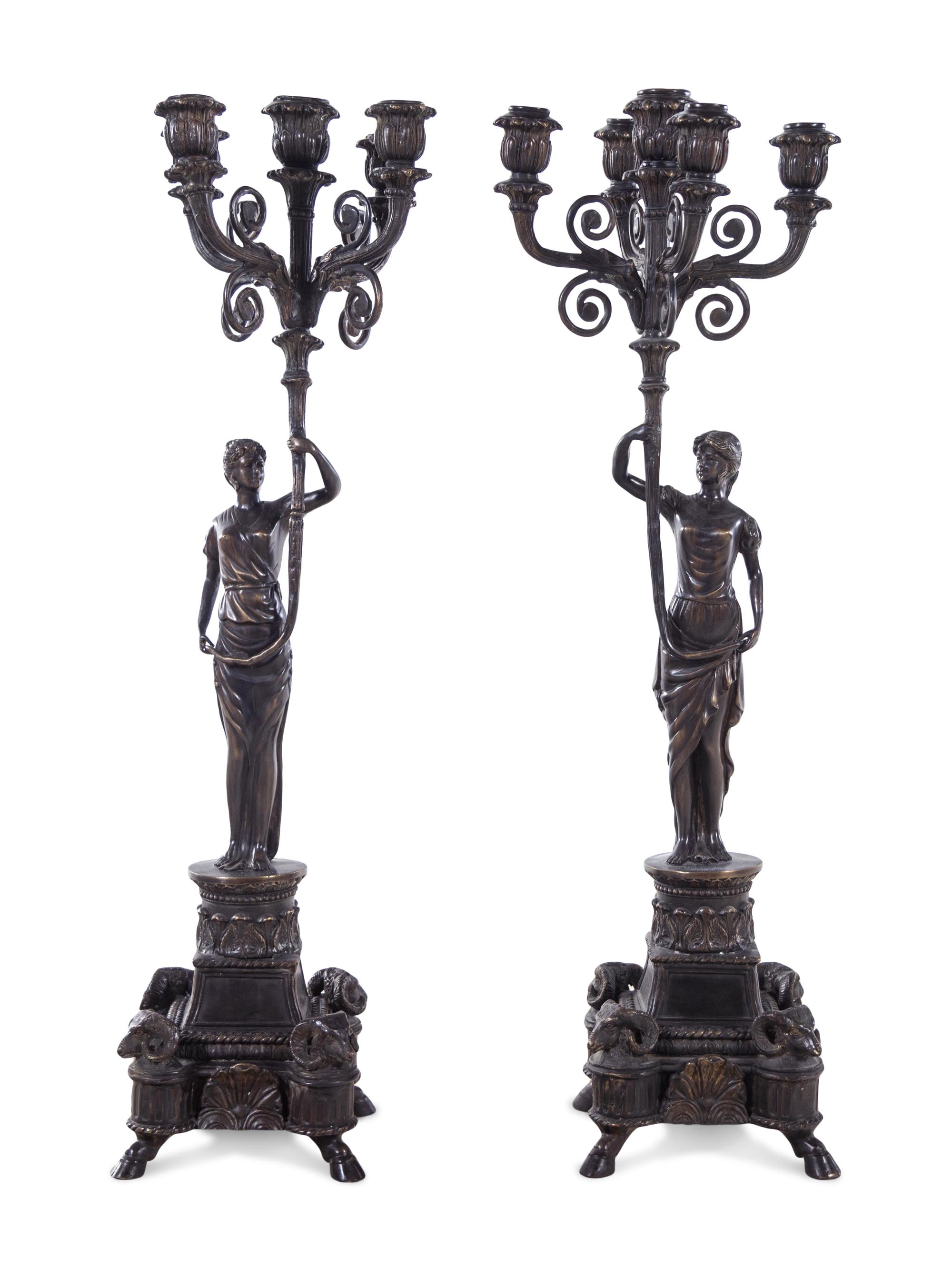 A Pair of Empire Style Silvered Metal Figural Five-Light Candelabra