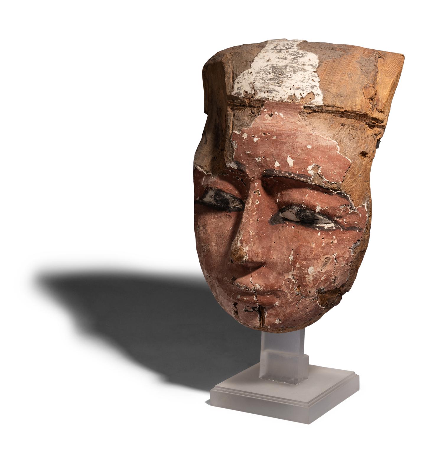 An Egyptian Painted Wood Mummy Mask