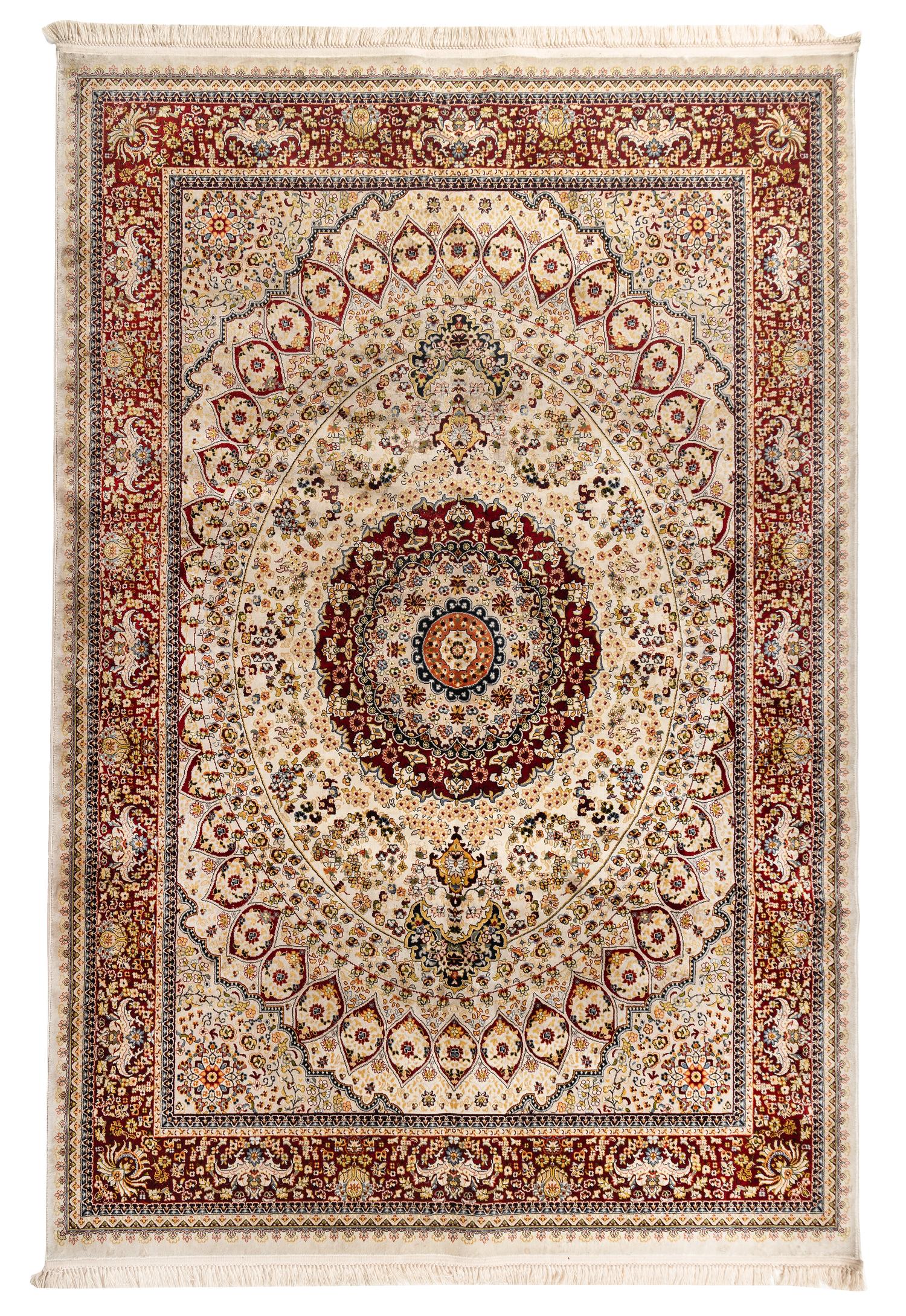 A Qom Wool and Silk Rug
