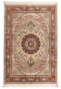 A Qom Wool and Silk Rug