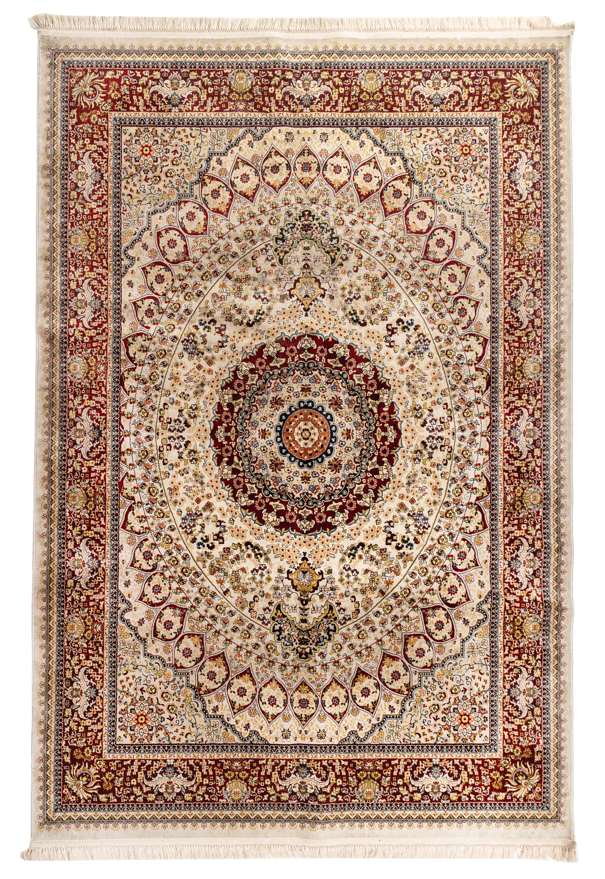 A Qom Wool and Silk Rug