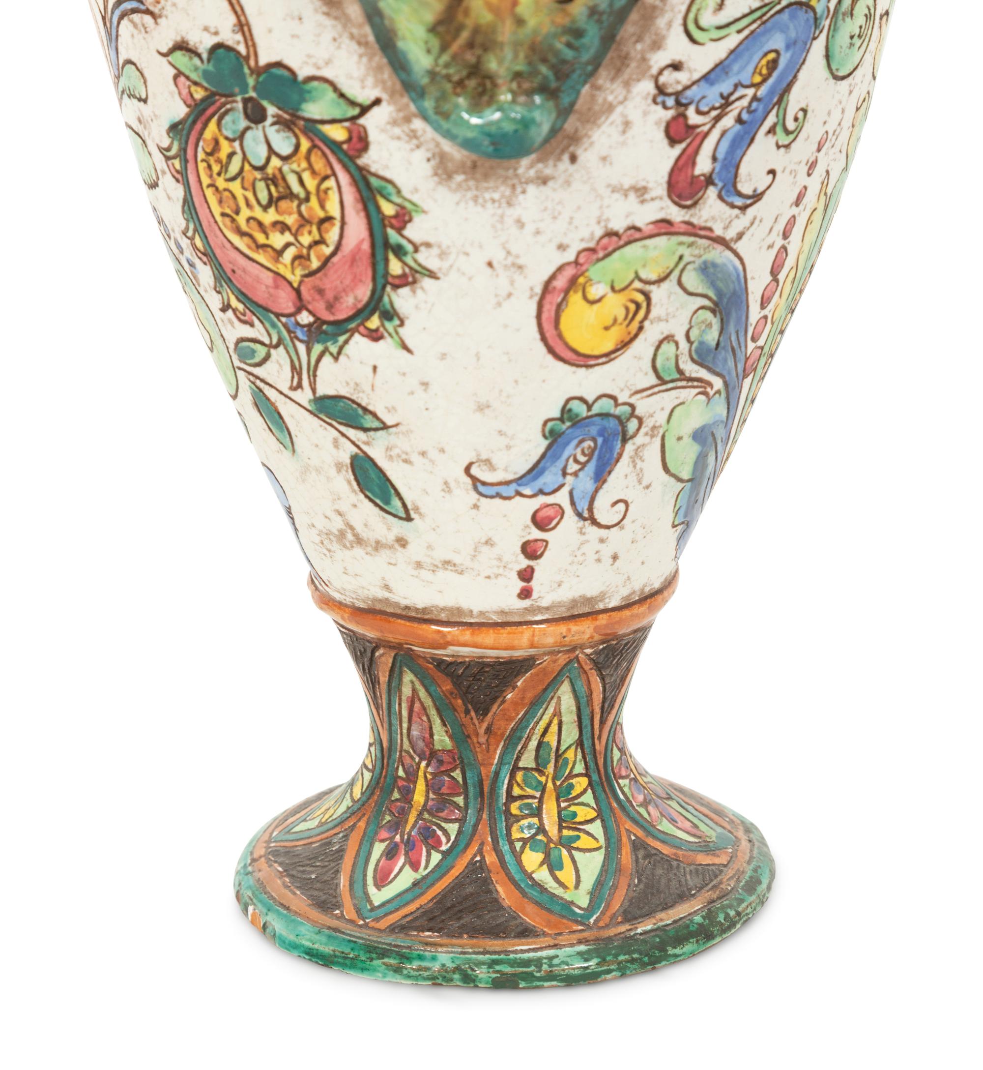 An Italian Majolica Covered Urn with Lion Mask Handles