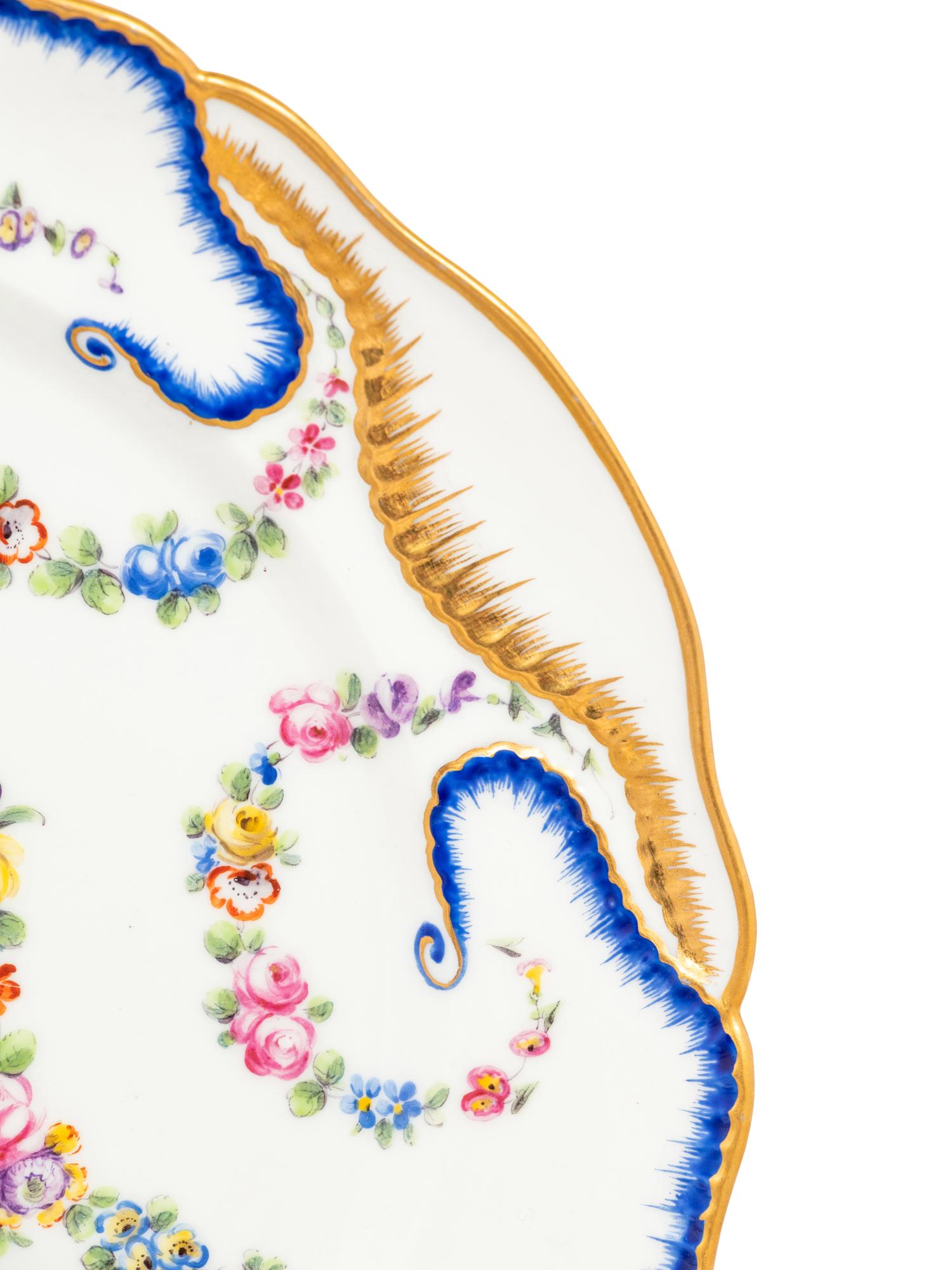 An Assembled Sèvres Feuille-de-Choux Porcelain Part Service Painted with Trophies