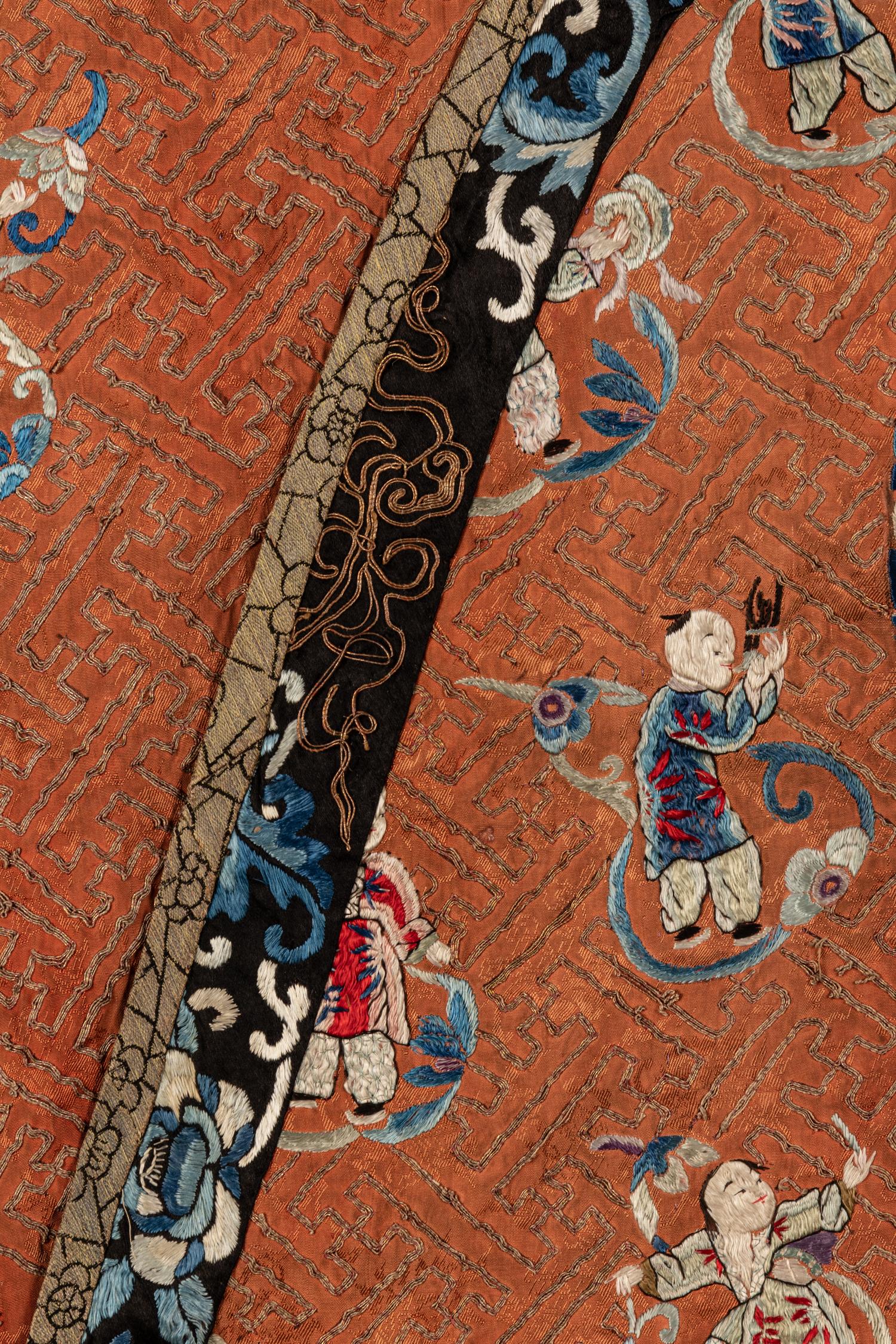 An Apricot Ground Embroidered Silk Lady’s Informal Robe
