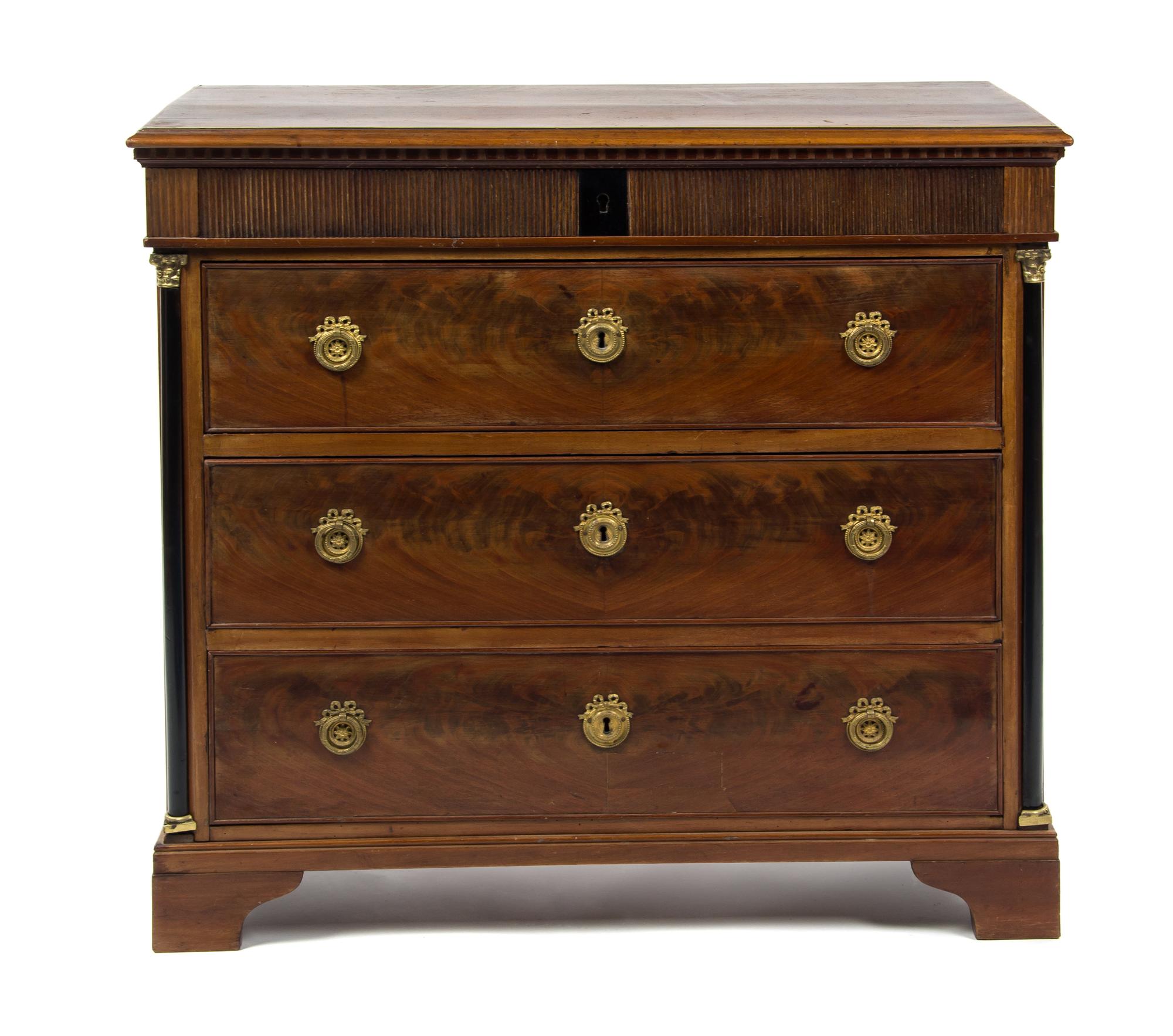 An Empire Style Mahogany Commode, Height 32 x width 35 x depth 19 1/4 inches.